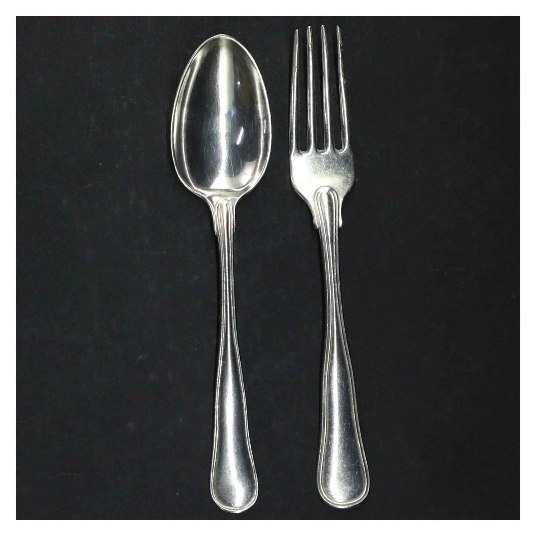 S&oslash;lvbestik dobbelt riflet.