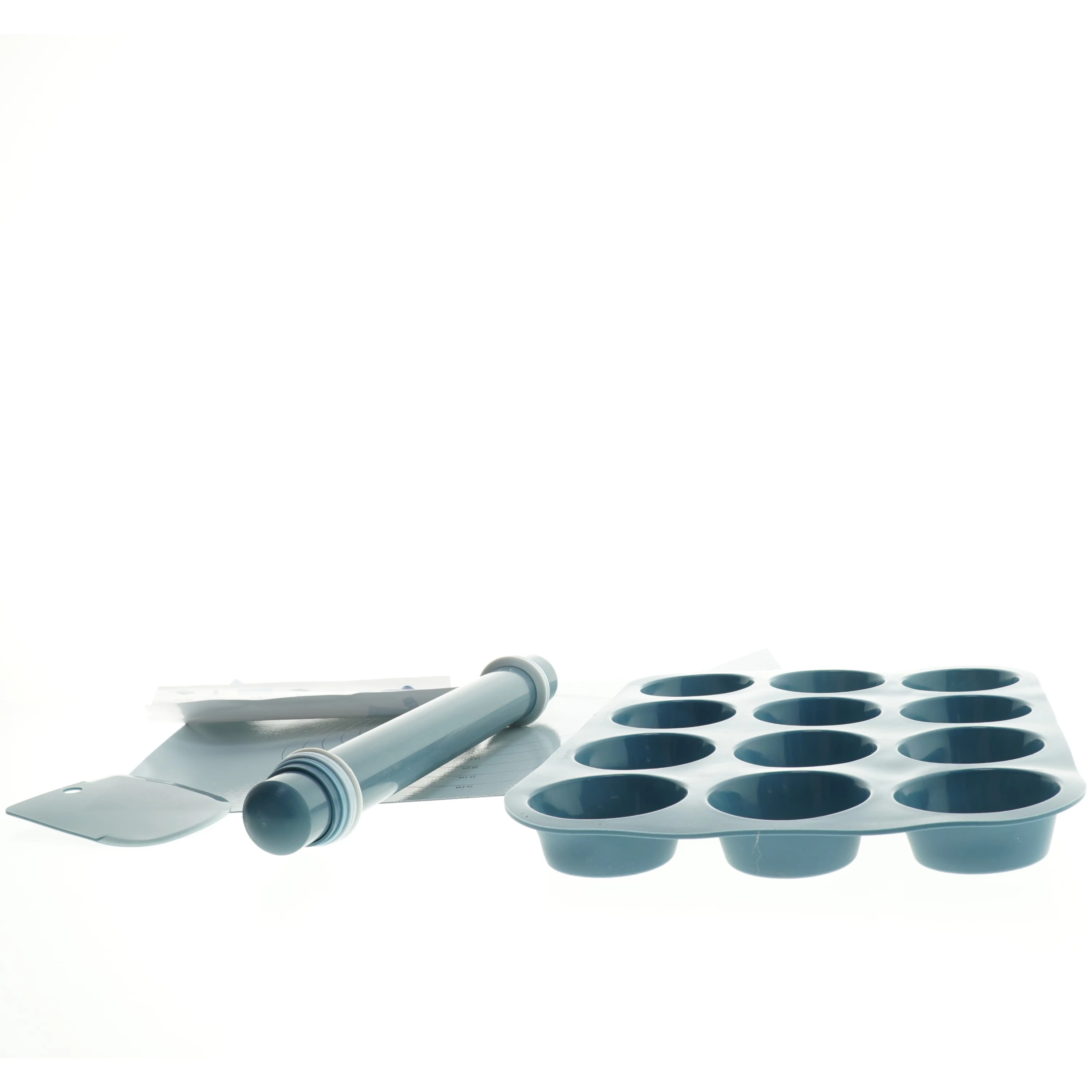 Bages&aelig;t med muffinform og dejskraber