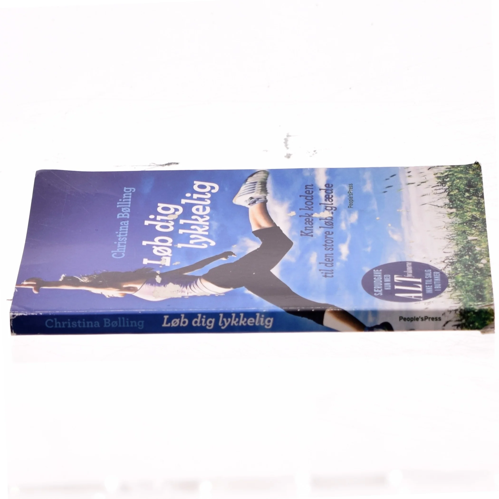 Løb dig lykkelig : knæk koden til den store løbeglæde af Christina Bølling (Bog)