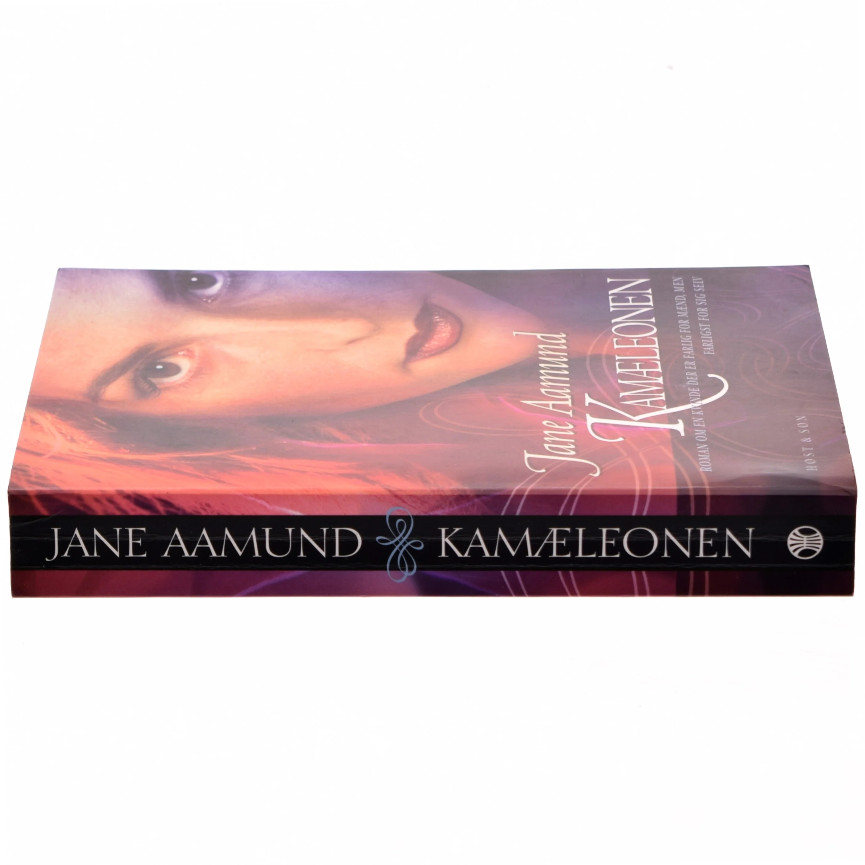 Kamæleonen : roman om en kvinde, der er farlig for mænd, men farligst for sig selv af Jane Aamund (Bog)