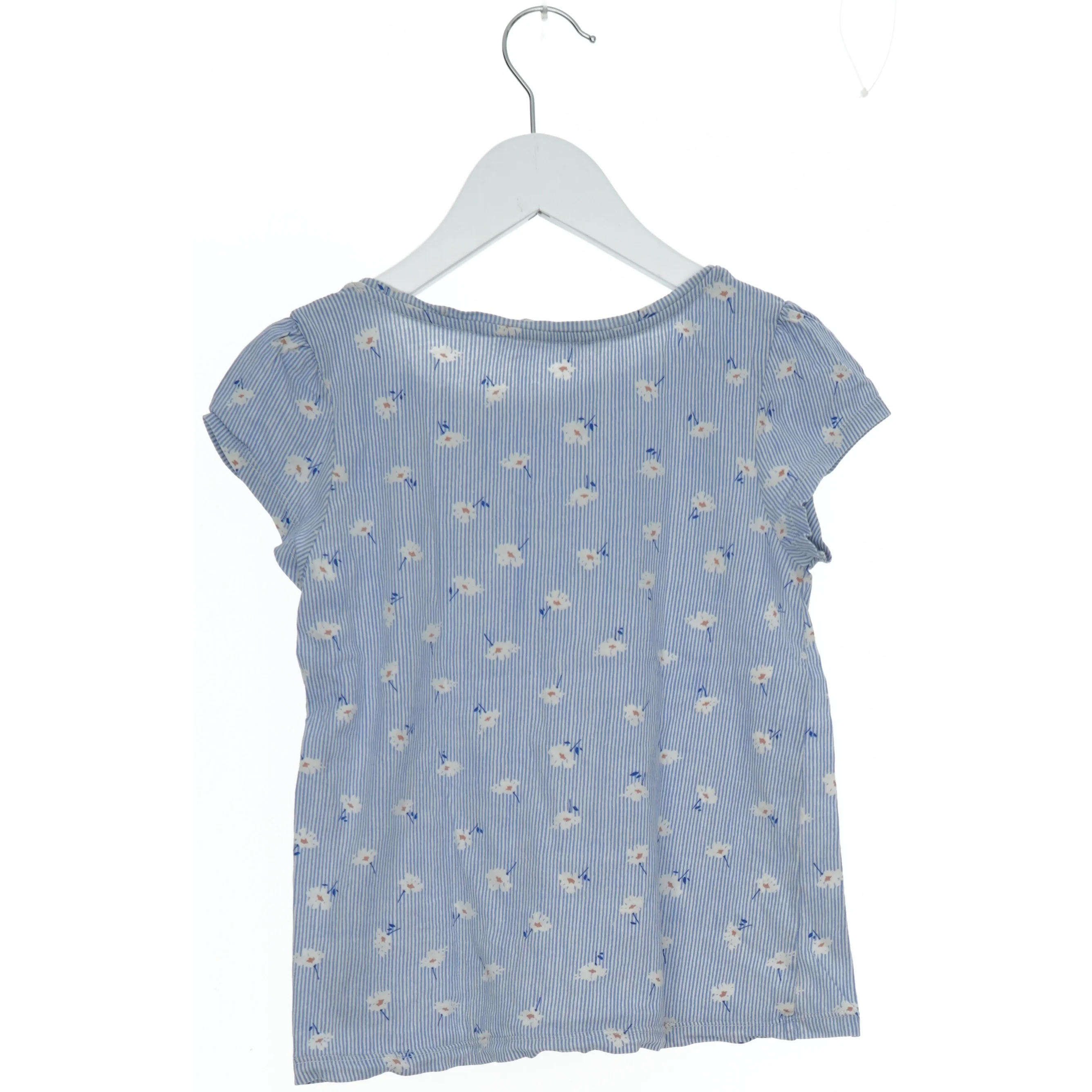 Blå bluse med blomsterprint fra H&M (str. 140)