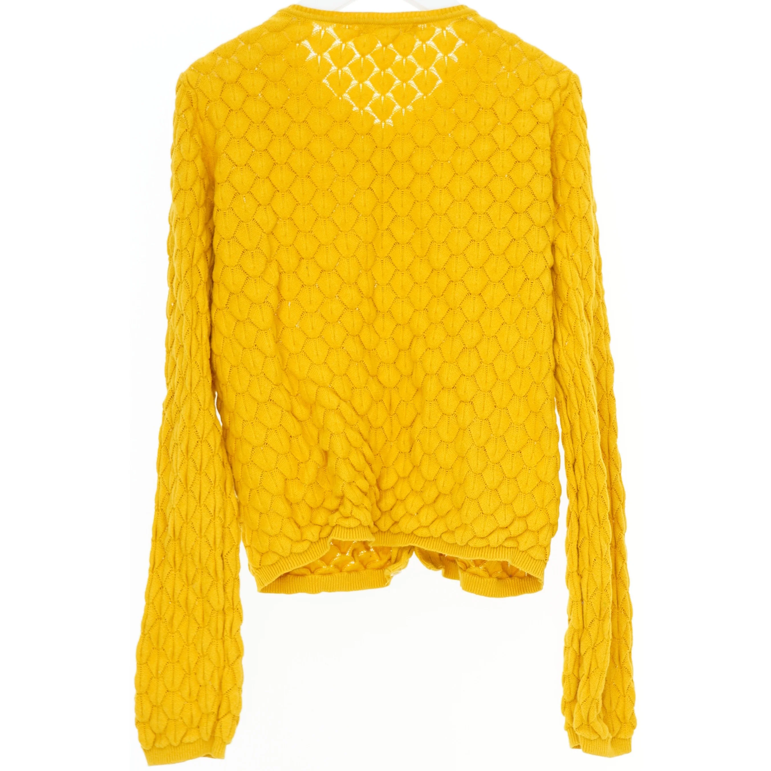 Gul cardigan med struktur fra H&M (str. 140)