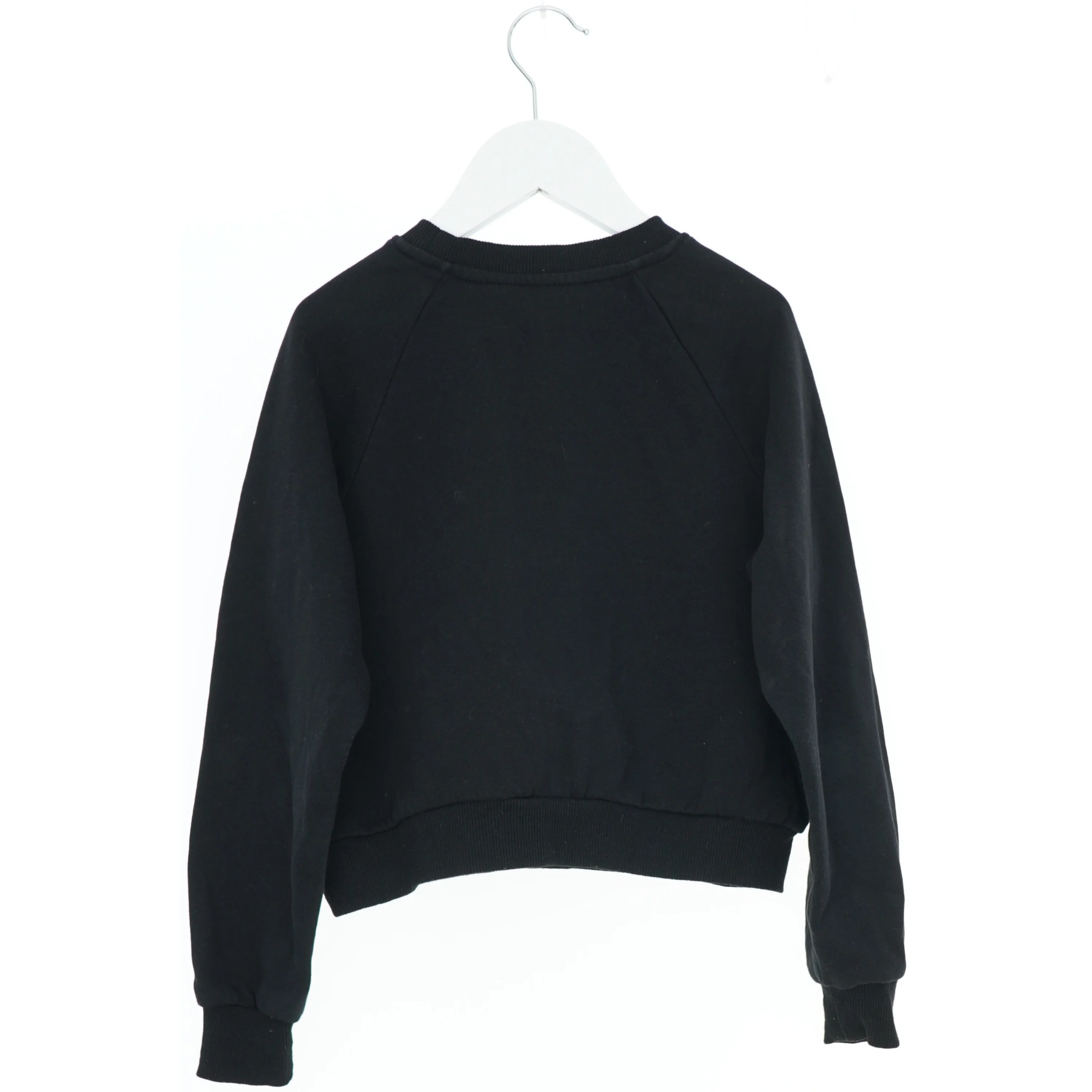 Sort sweatshirt med pailletter fra H&M (str. 140)