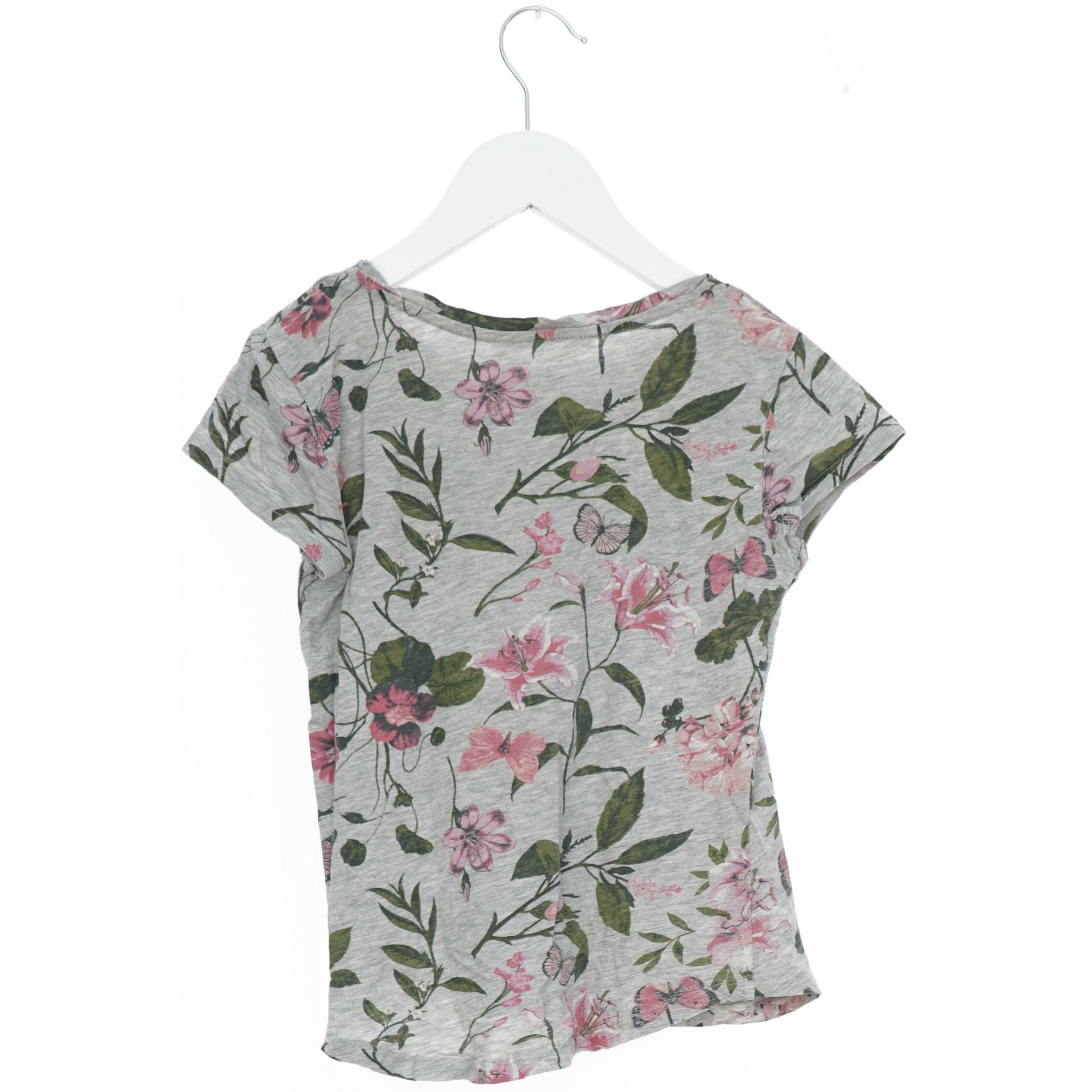 Bluse med blomsterprint fra H&M (str. 140)