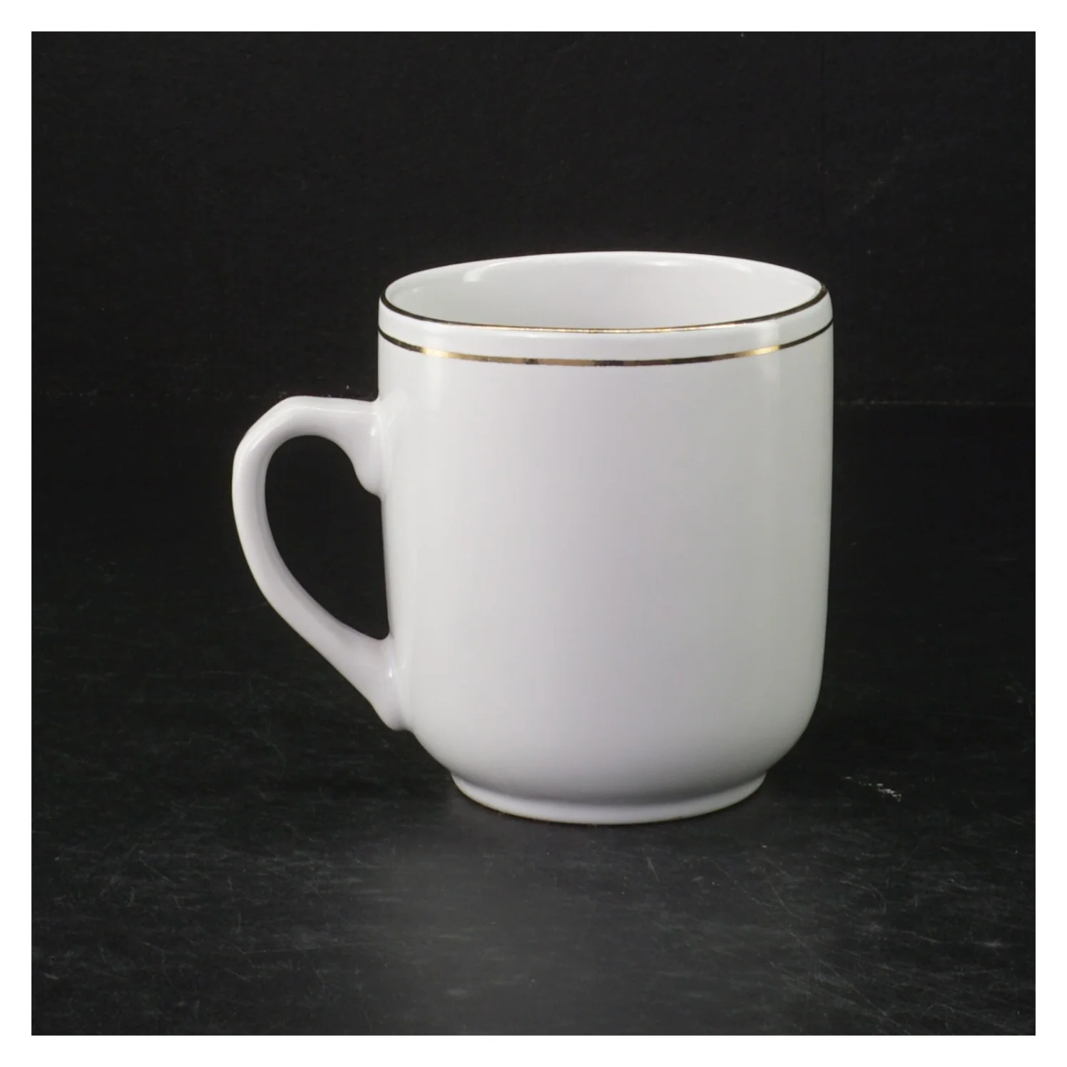 Mozart-temakrus med guldkant (str. H. 9 cm. ø. 8 cm)