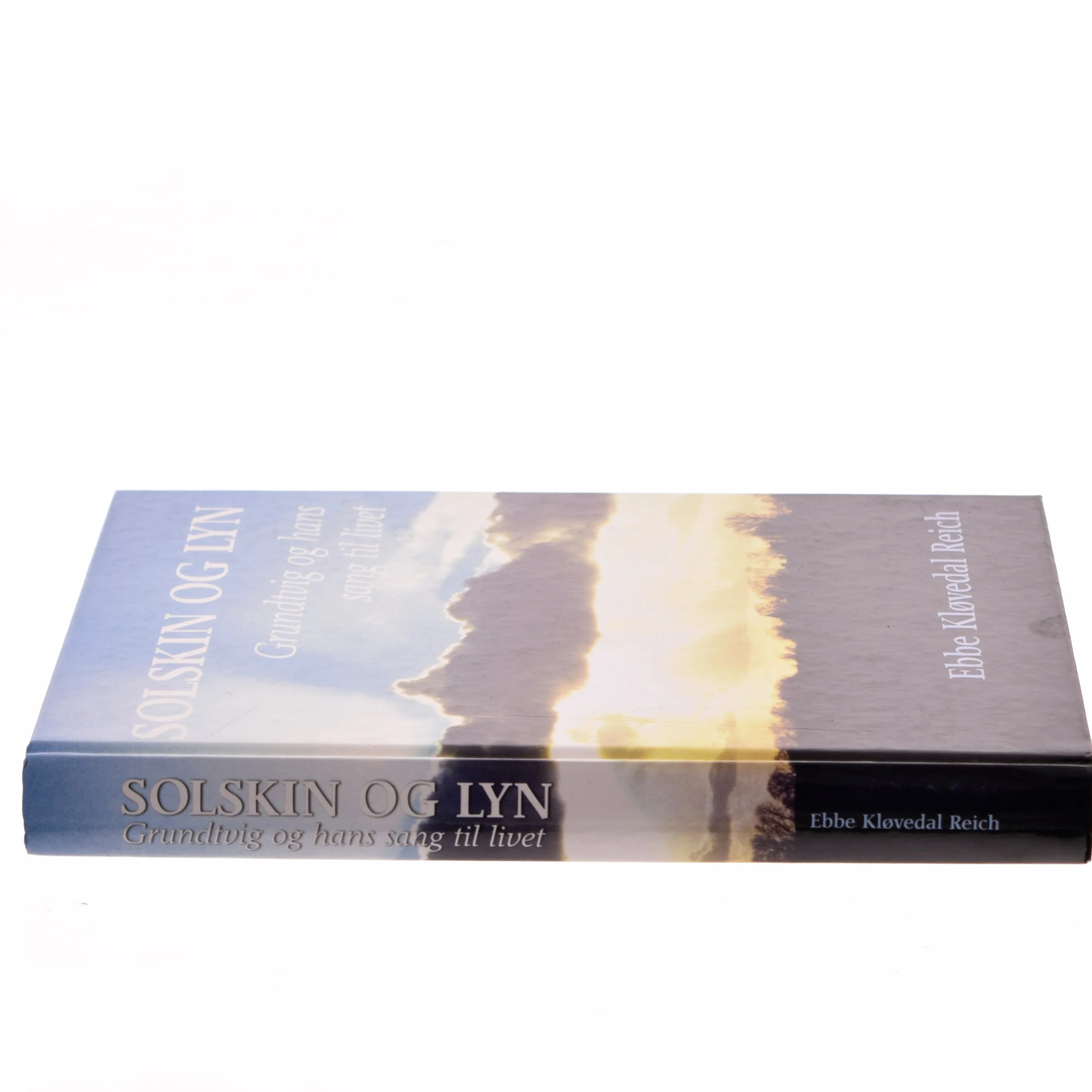 Solskin og lyn : Grundtvig og hans sang til livet af Ebbe Kløvedal Reich (Bog)