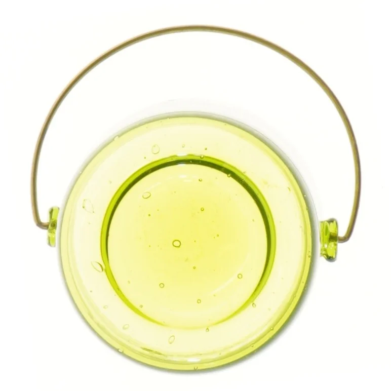 Lille rund glasbeholder med messing hank (str. Ø 11 cm længde 11 cm)