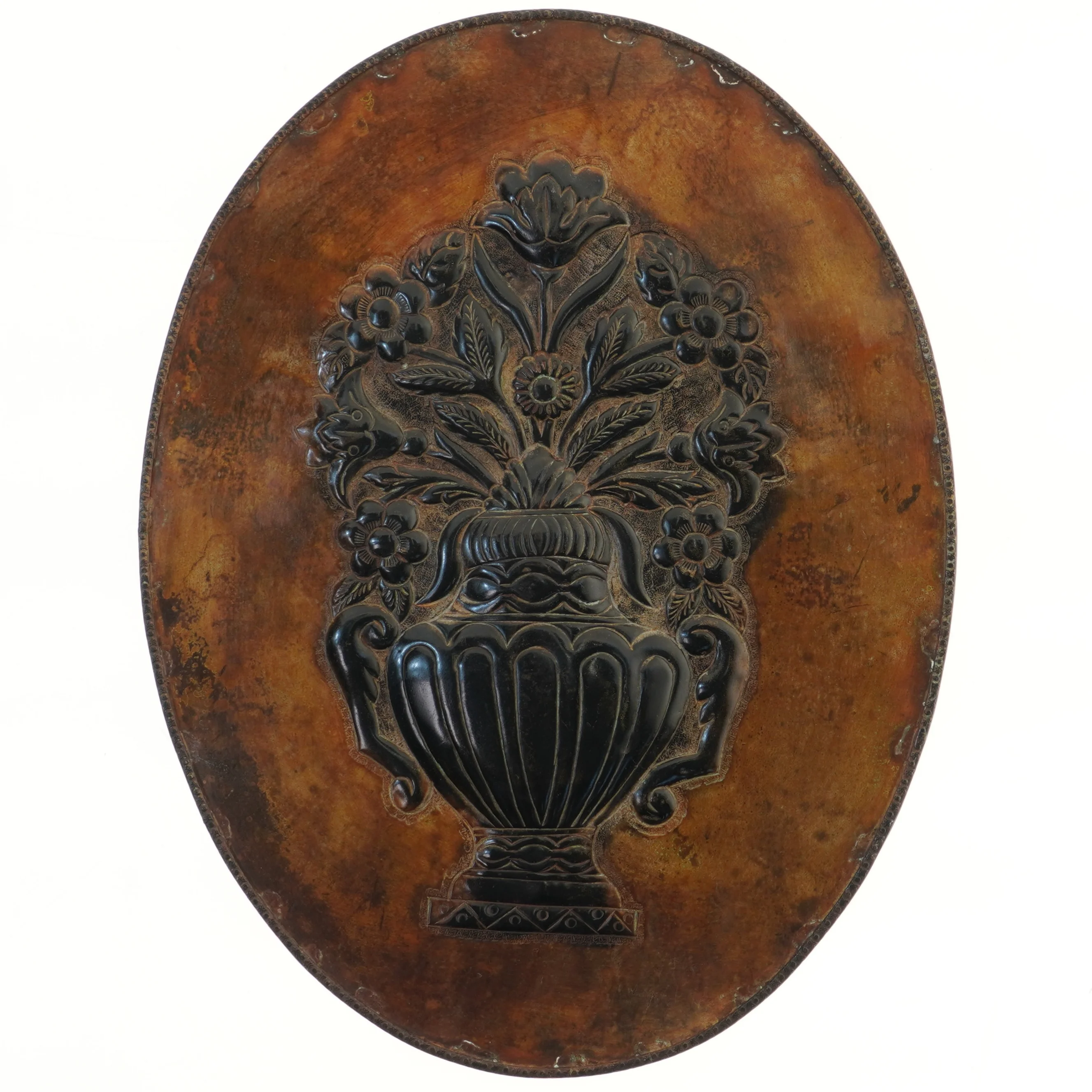 Oval metal vægdekoration med vase og blomster (str. 55x42 cm)