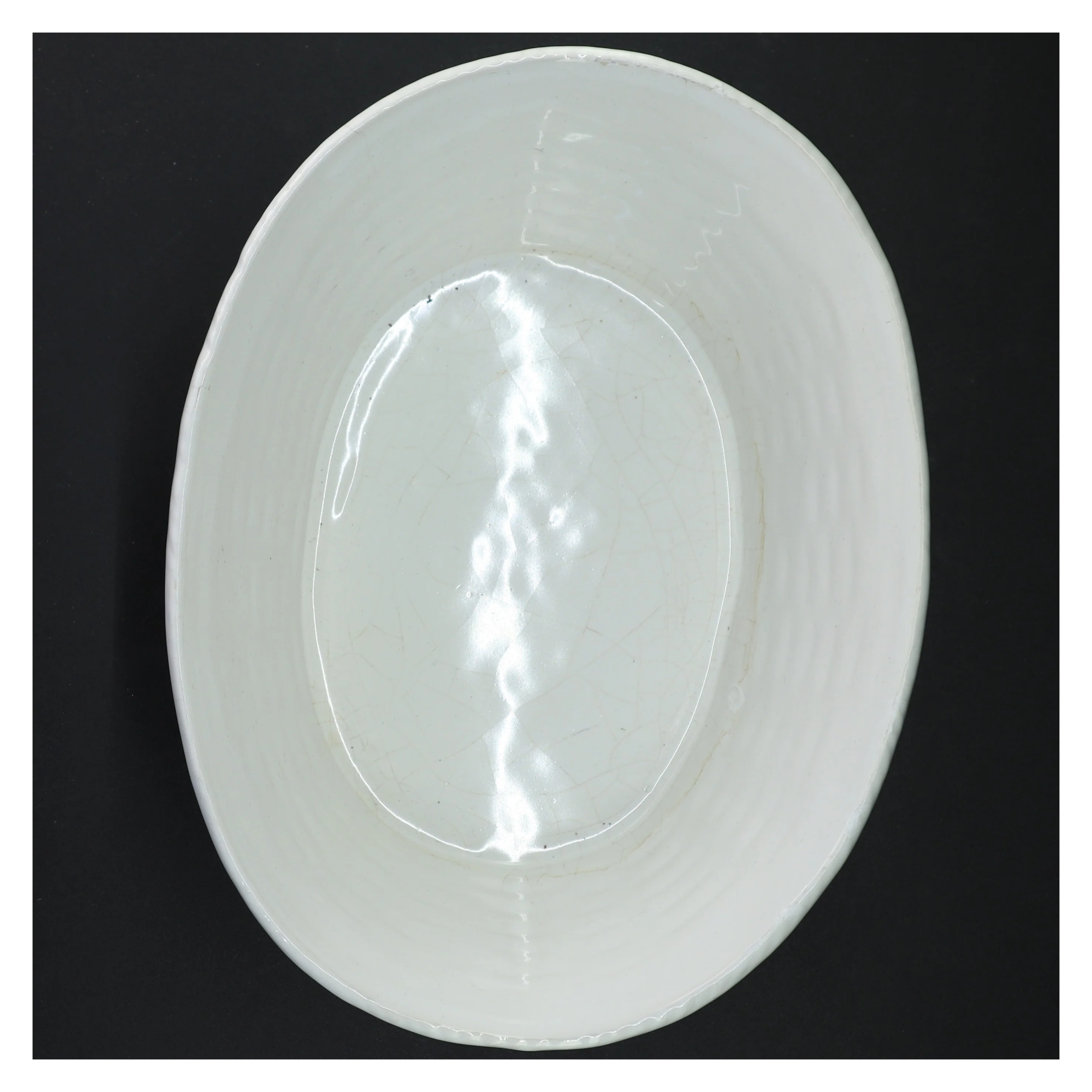 Hvid kurveflet porcelænsskål (str. 27 x 20 x 12 cm)