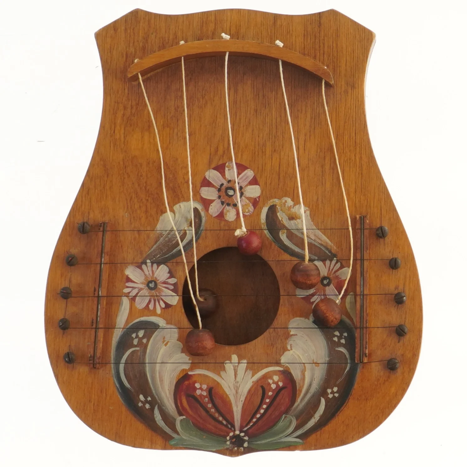 Dekorativt d&oslash;rharpe, et traditionelt skandinavisk musikinstrument og samlerobjekt, der typisk h&aelig;nges p&aring; indersiden af en d&oslash;r. Oprindelse: Stammer fra Skandinavien (Sverige, Norge, Danmark) og har eksisteret i mindst tre &aring;rhundreder. Funktion: N&aring;r d&oslash;ren &aring;b