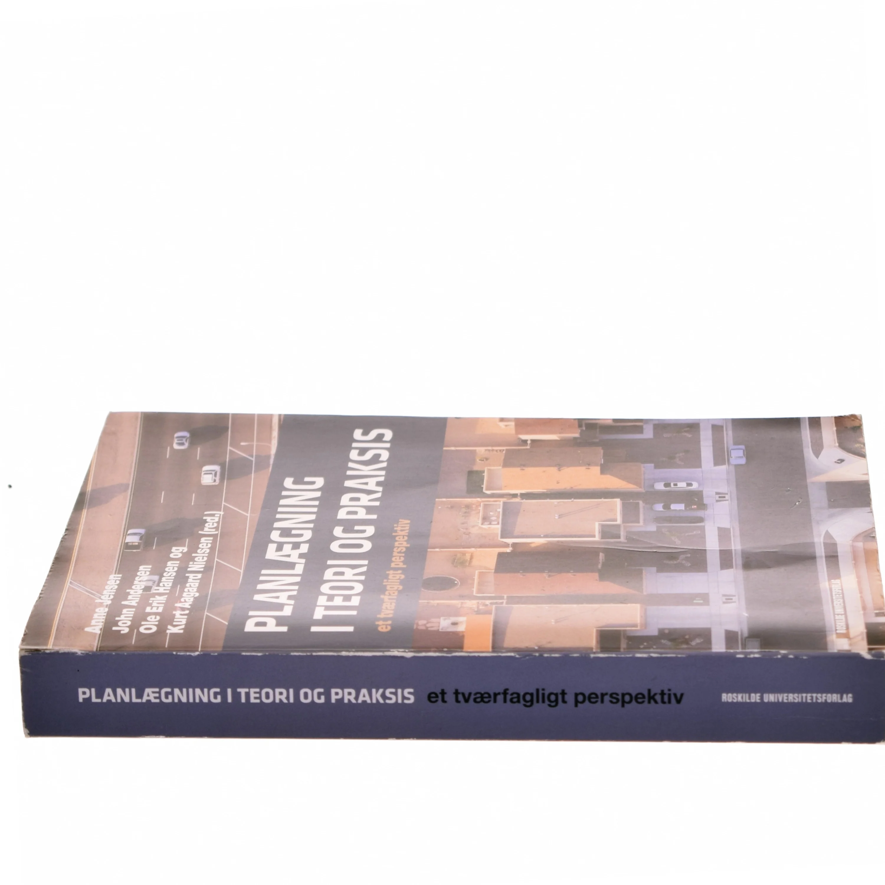 Planlægning i teori og praksis : et tværfagligt perspektiv af Anne Jensen (f. 1967-07-13) (Bog)