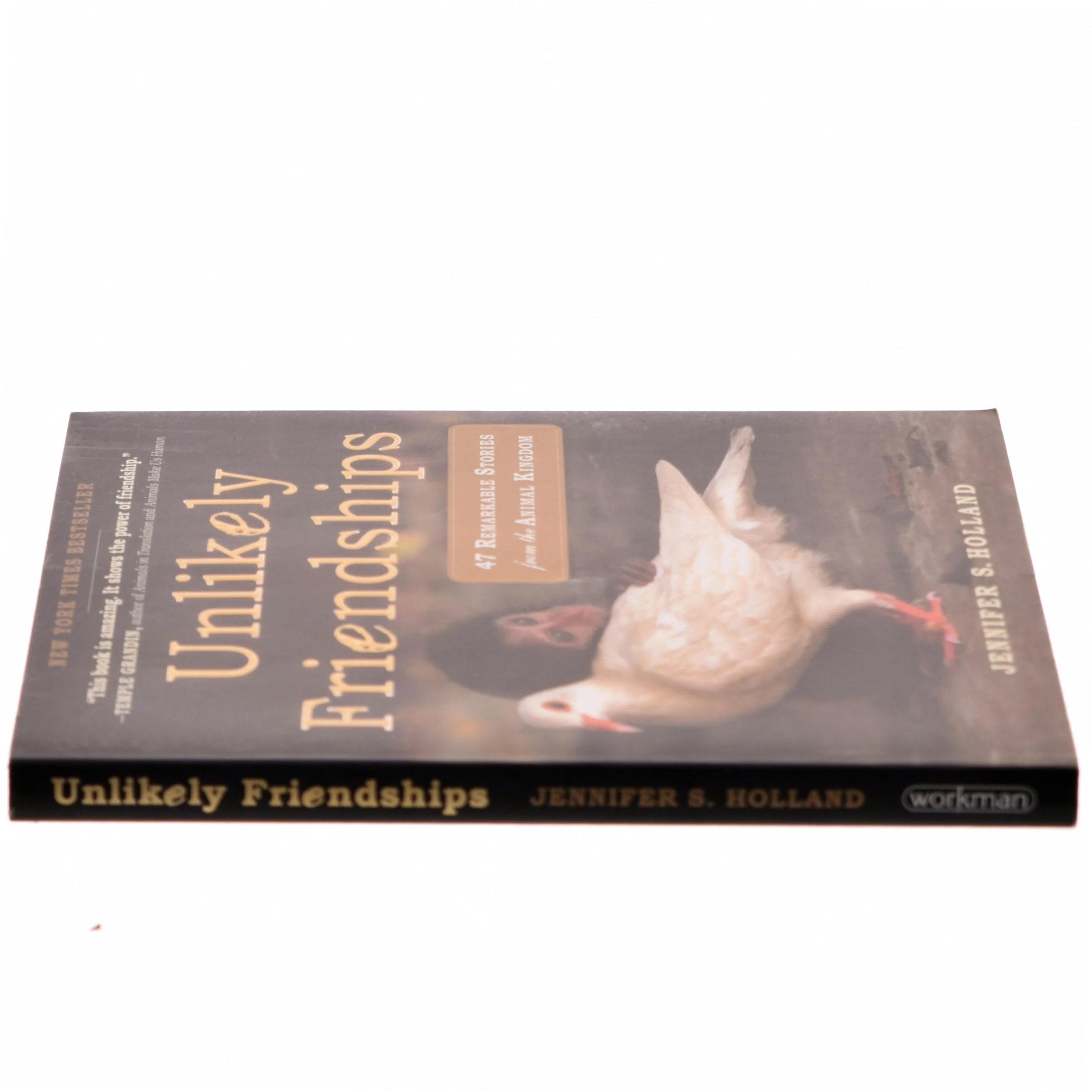 Unlikely friendships : 47 remarkable stories from the animal kingdom af Jennifer S. Holland (Bog)