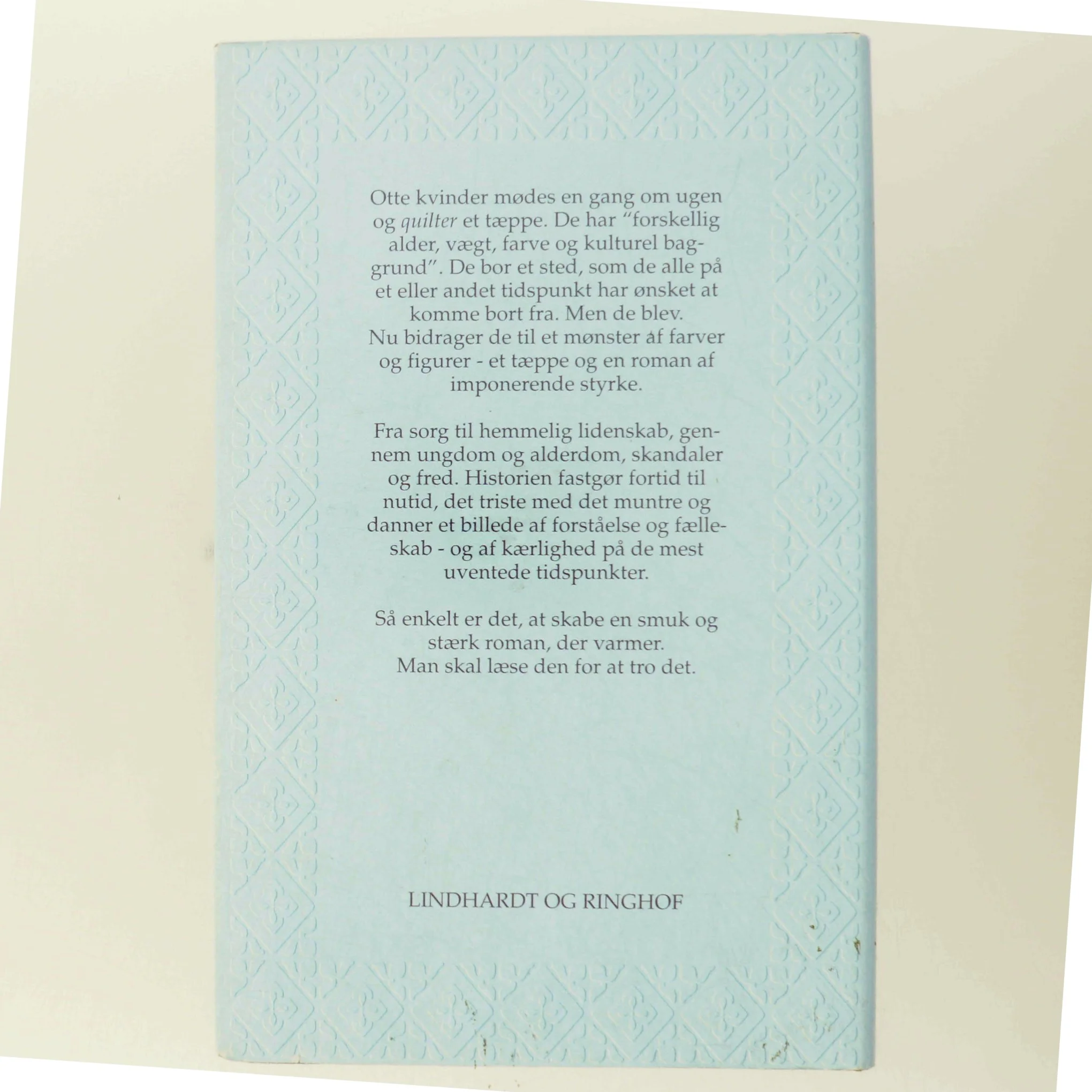 Sådan laver man en amerikansk quilt af Whitney Otto fra Lindhardt og Ringhof