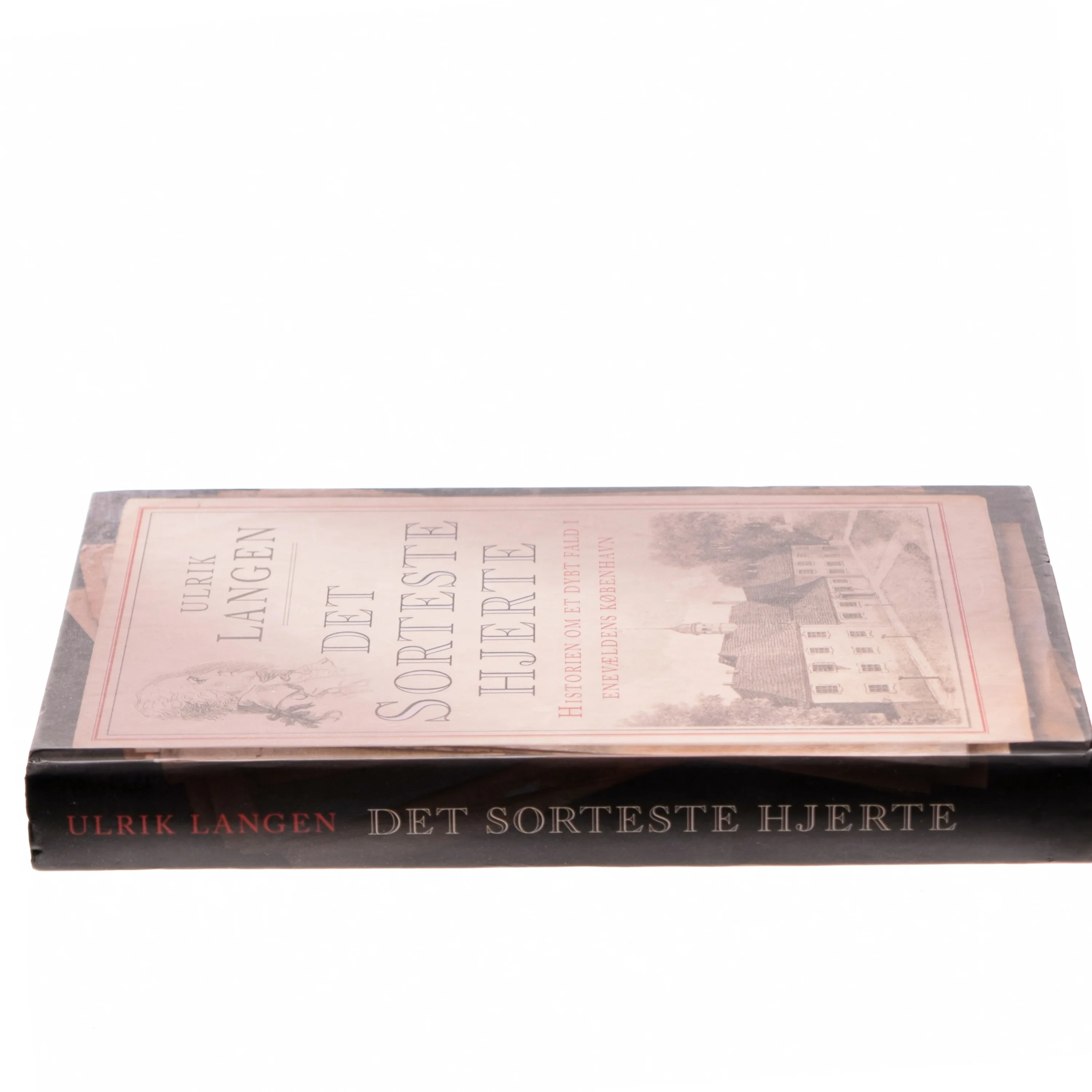 Det sorteste hjerte : historien om et dybt fald i enevældens København af Ulrik Langen (Bog)