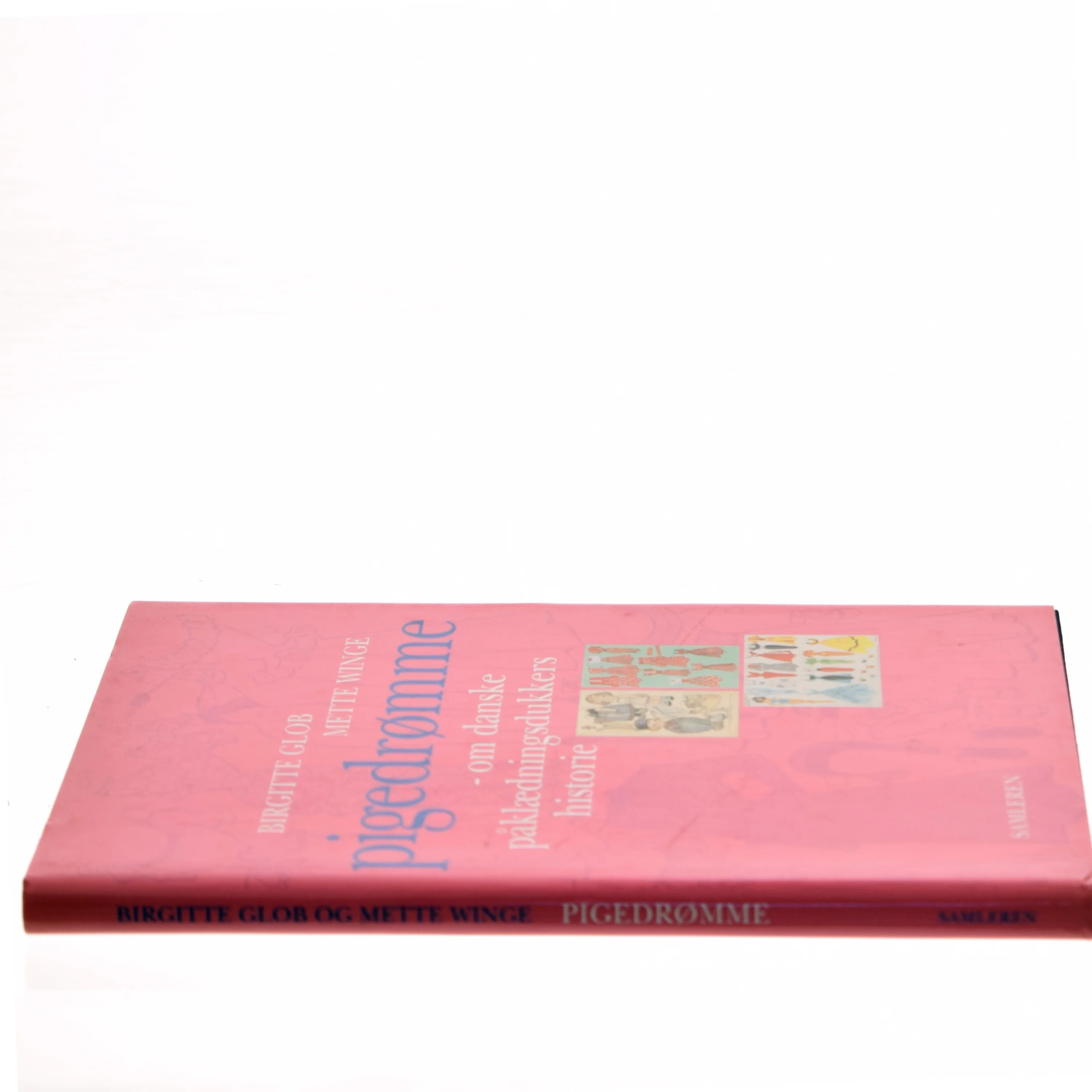 Pigedrømme : danske påklædningsdukkers historie (Bog)