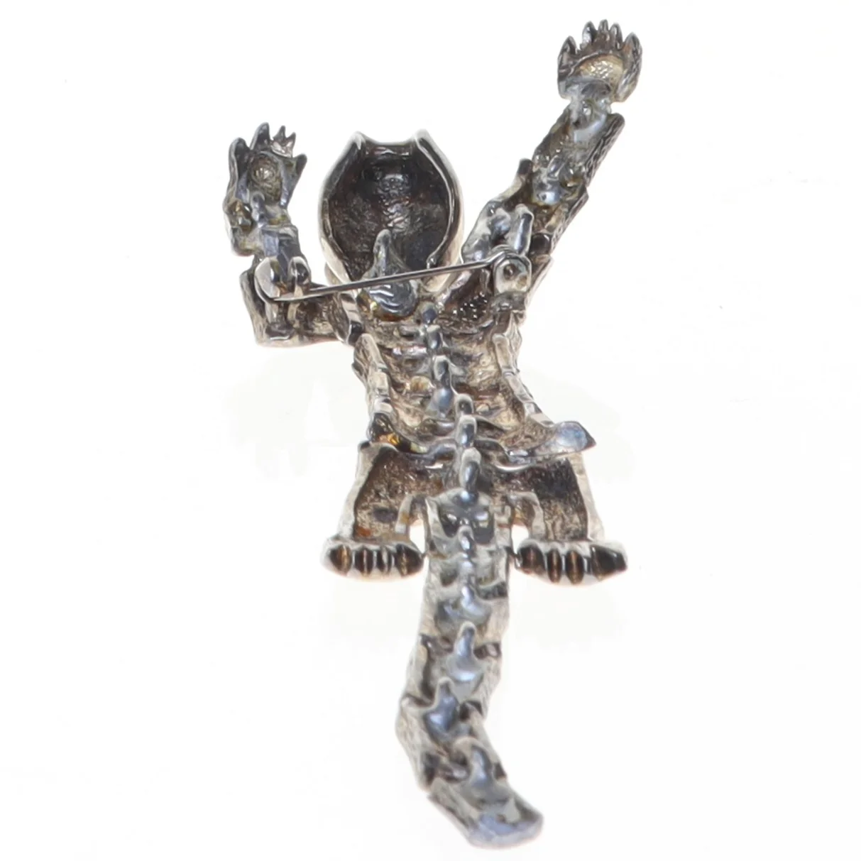 Sølvbrosche af (str. 15 x 5 cm)