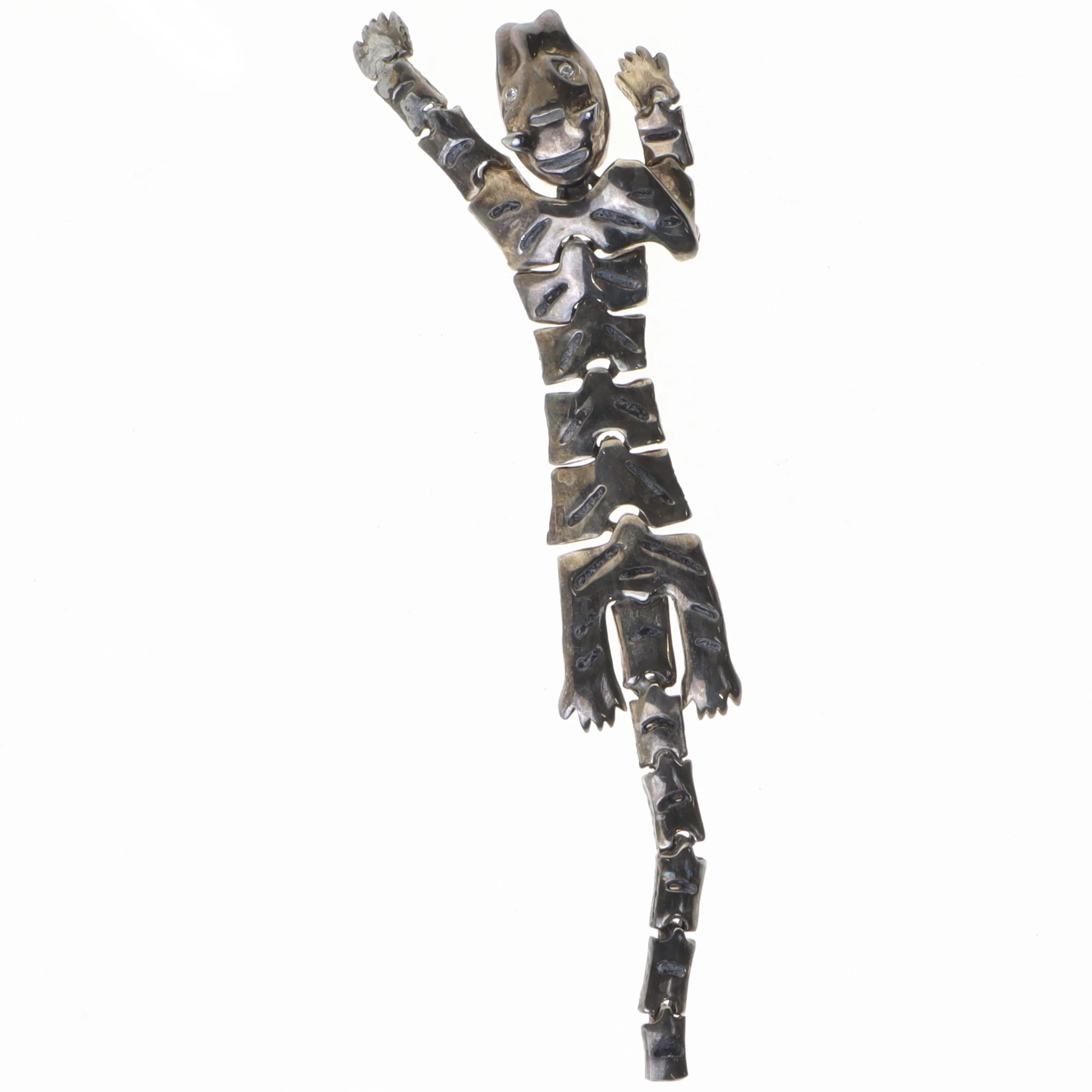 Sølvbrosche af (str. 15 x 5 cm)