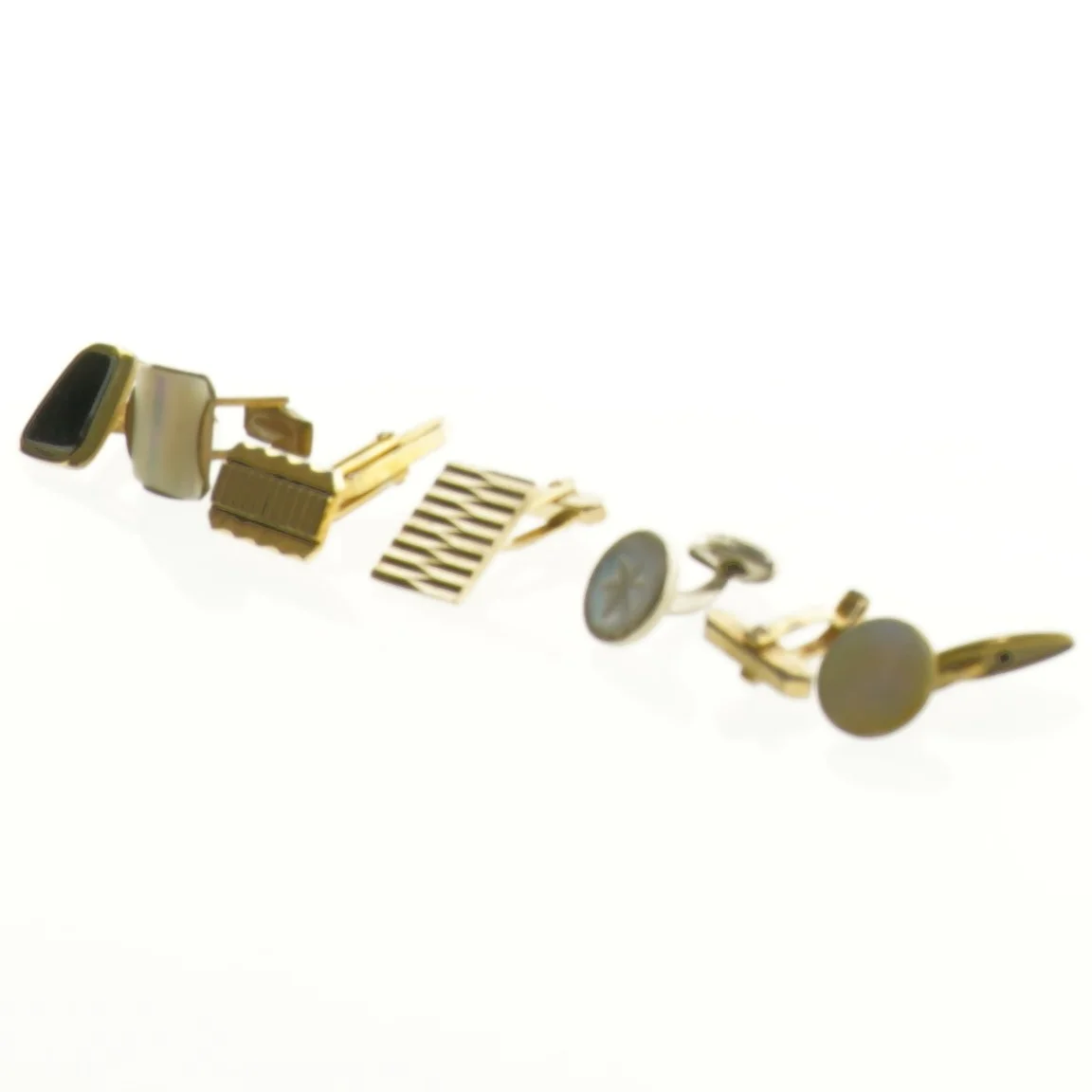 Manchetknapper i blandet design