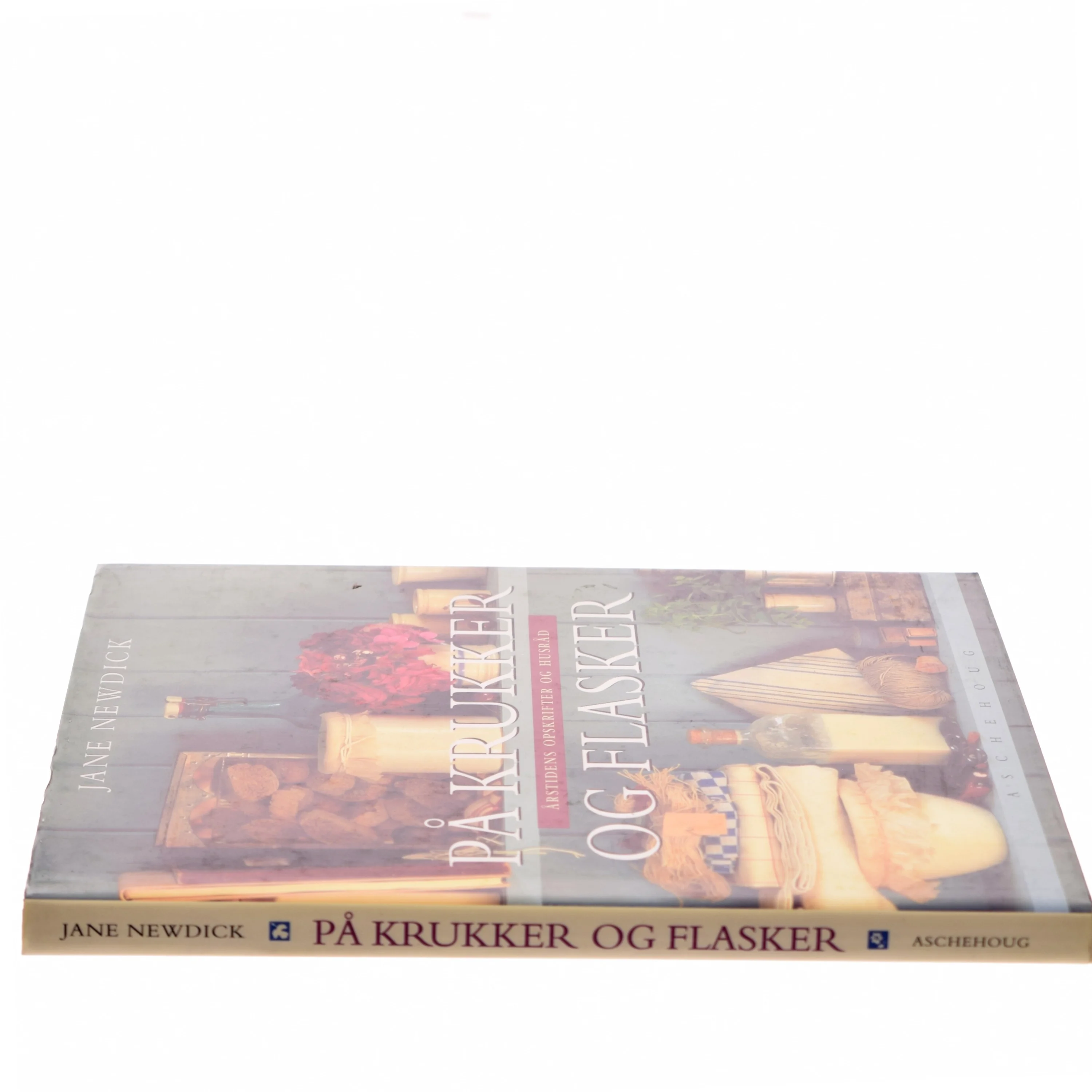 På krukker og flasker : årstidens opskrifter og husråd af Jane Newdick (Bog)