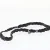 Flettet læderarmbånd med charms fra STORY (str. Ø 15 cm)