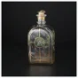 Dekorativ glaskflaske med forgyldte detaljer fra Holmegaard (str. 19 x 9 cm)