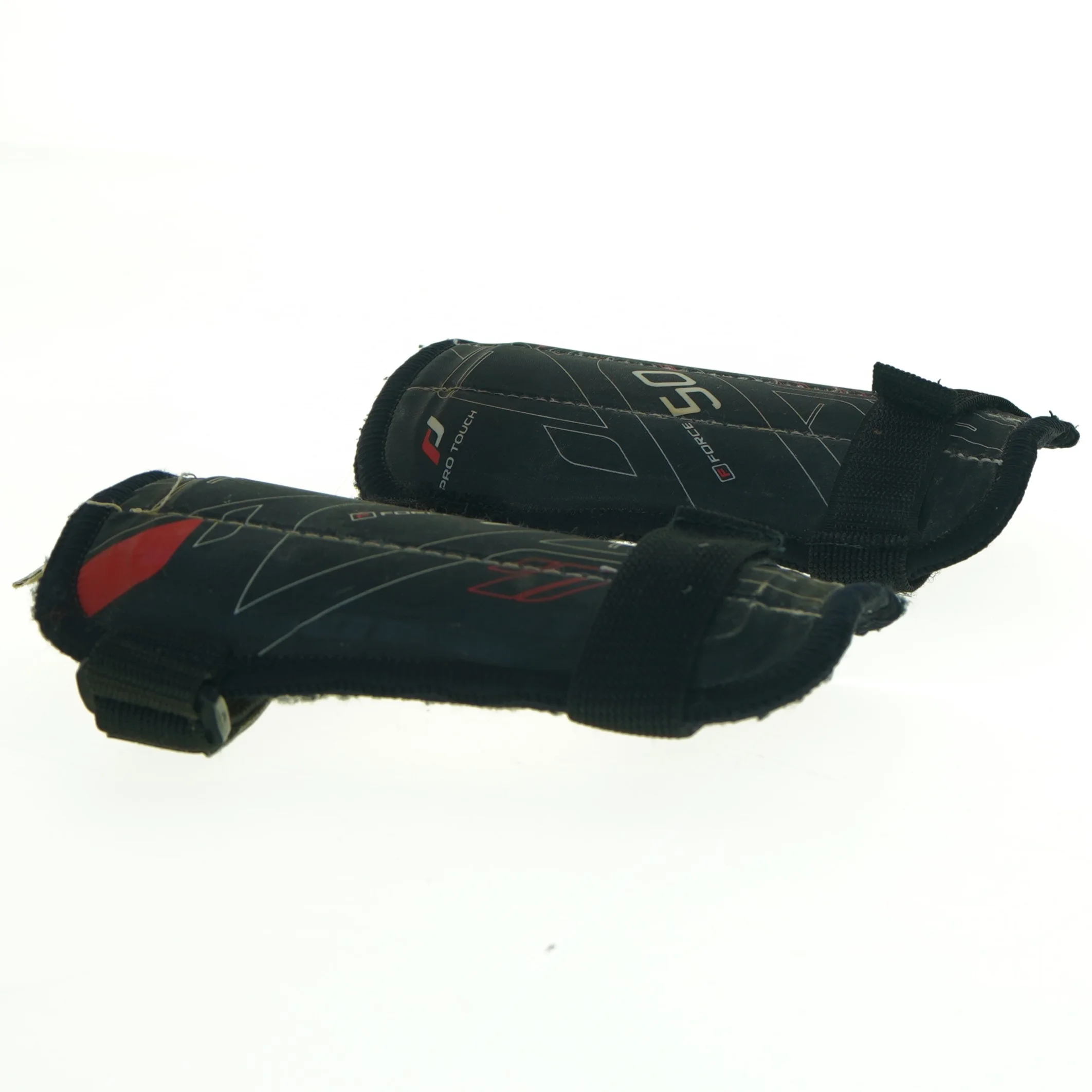 Benskinner til fodbold fra ProTouch (str. 17 xn 13 cm)