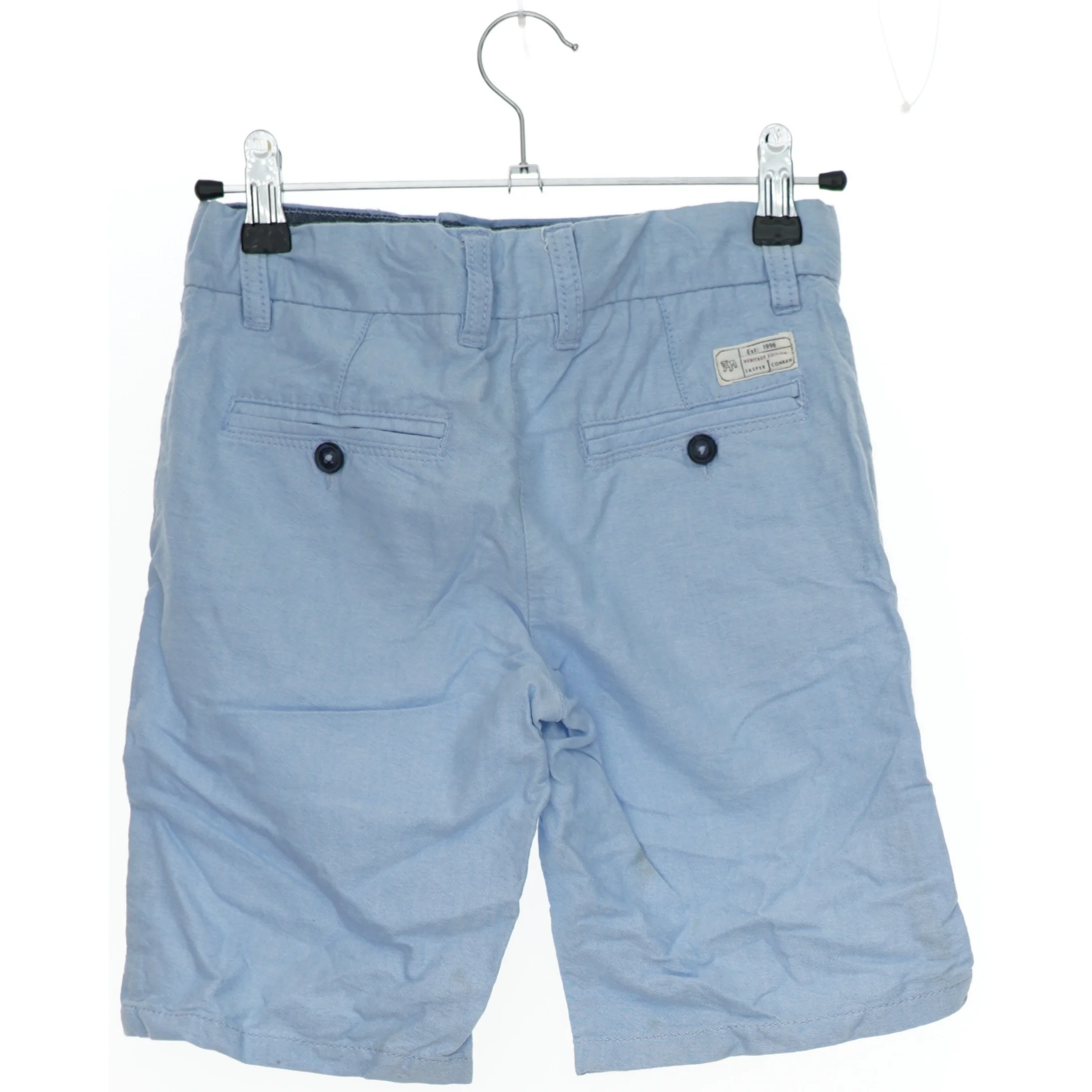 Lyseblå shorts fra Jasper J Conran (str. 134)