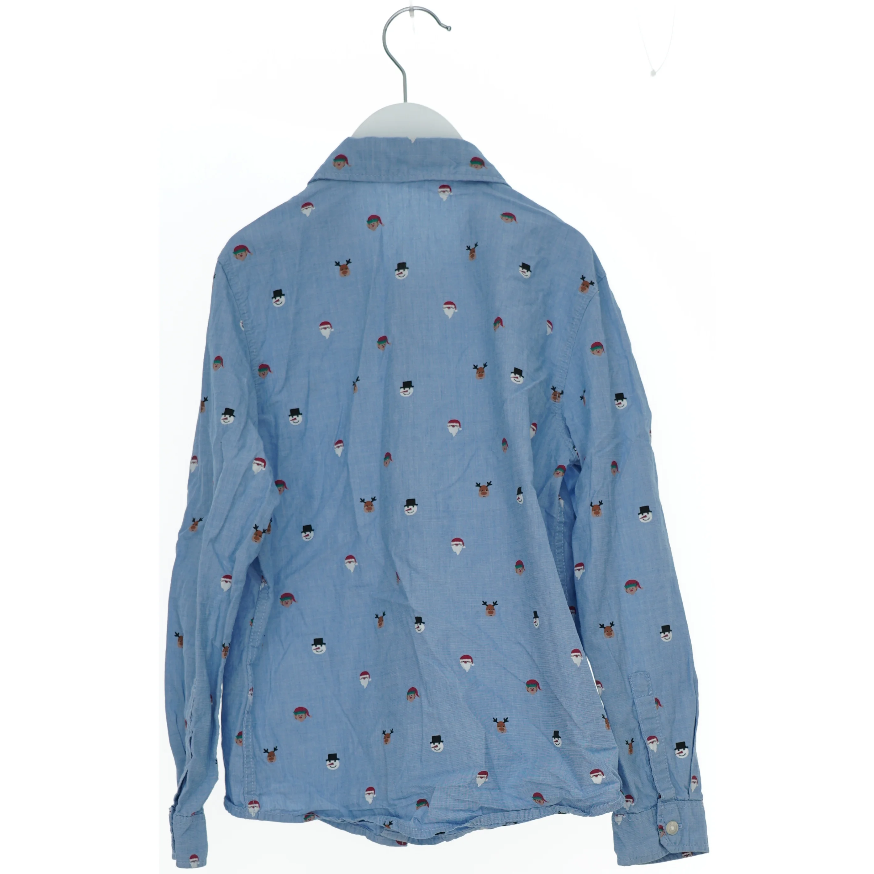Blå skjorte med julemotiver fra H&M (str. 128)