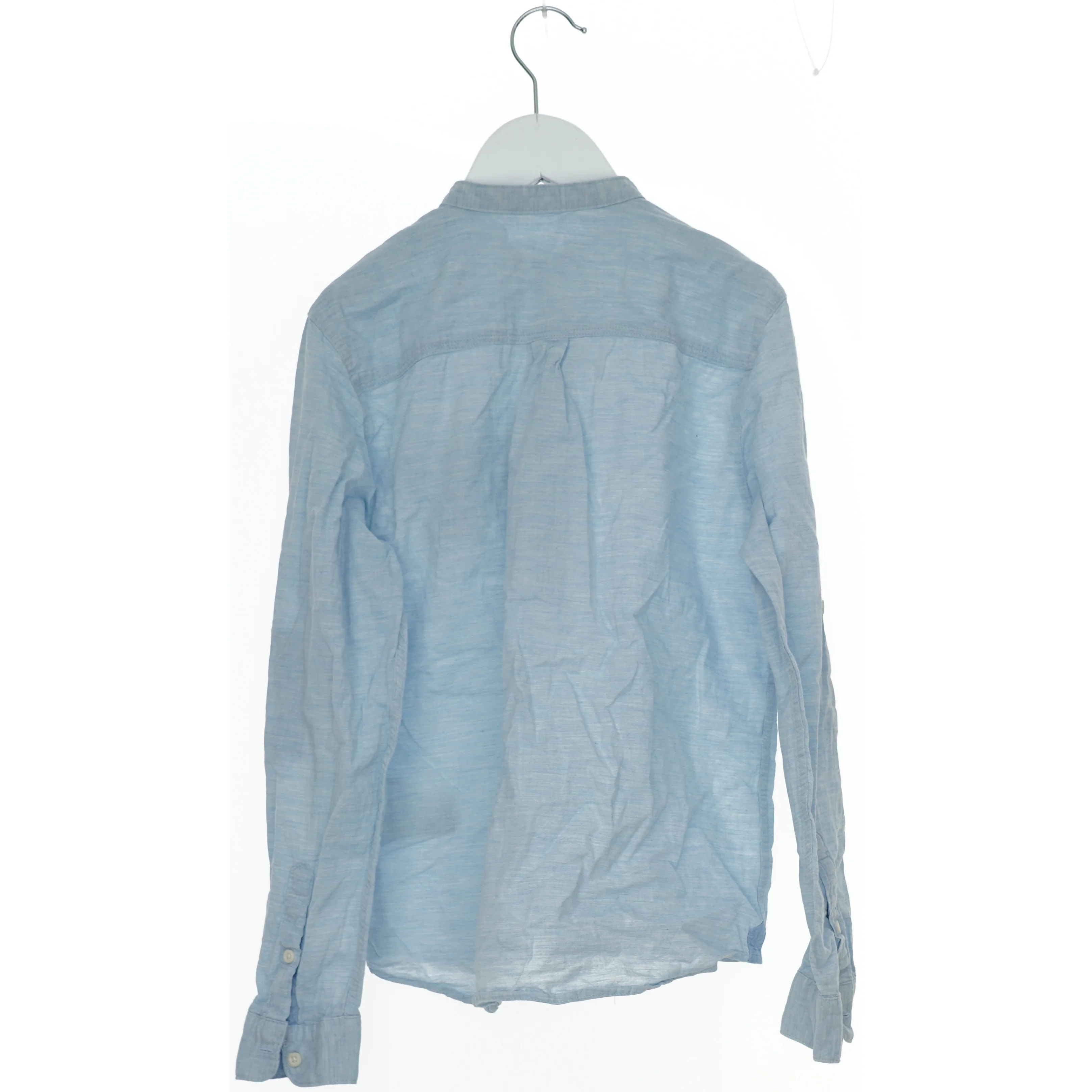 Lyseblå skjorte til børn fra H&M (str. 146)