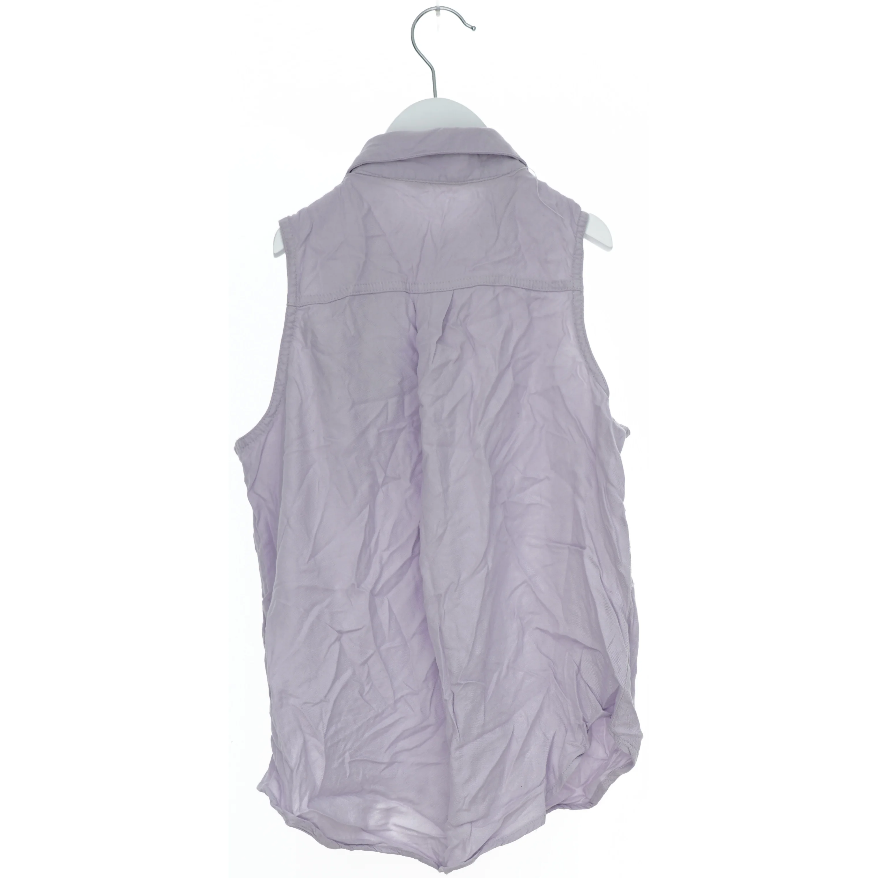 Ærmeløs skjorte med broderi fra H&M (str. 146)