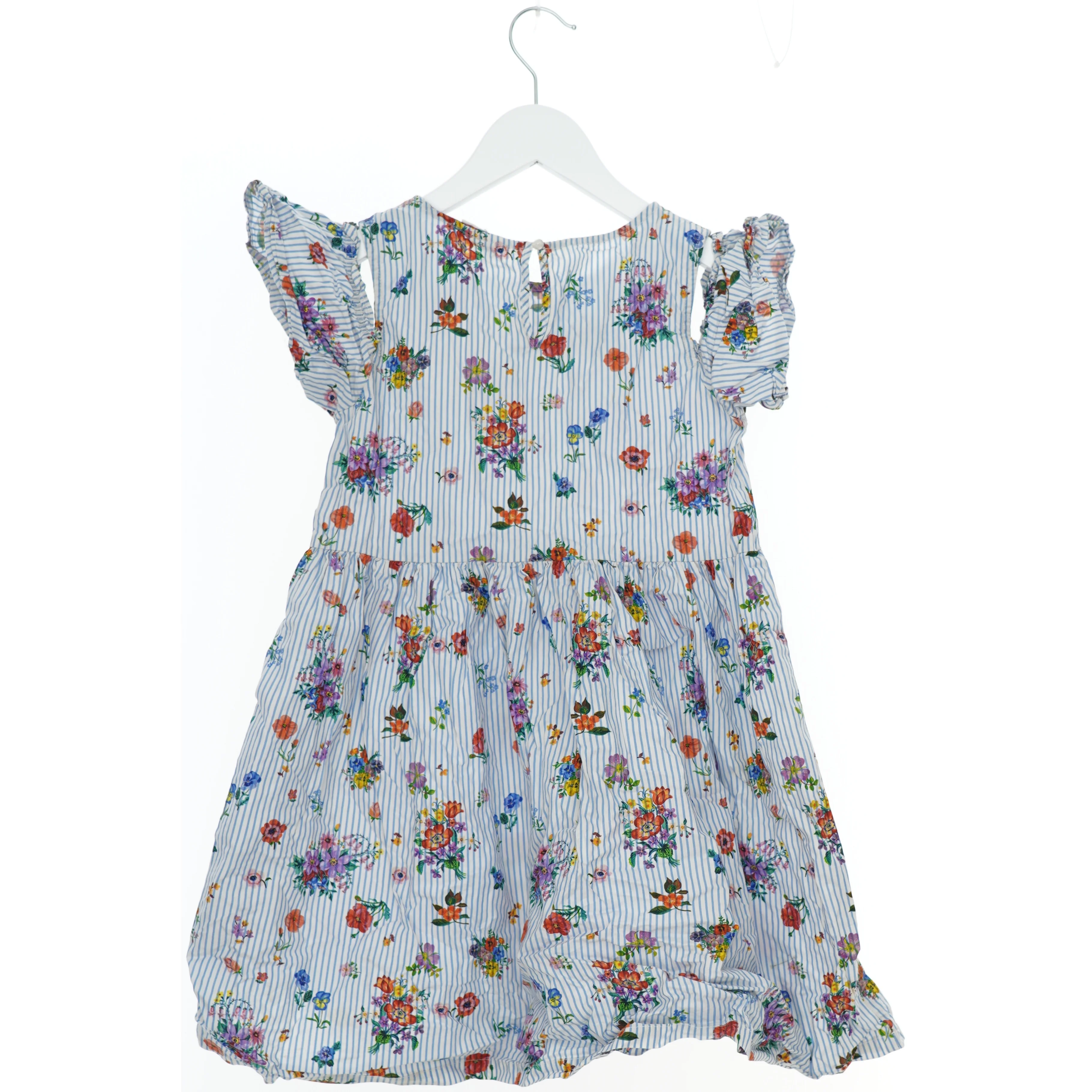 Blomstret kjole til børn fra H&M (str. 140)