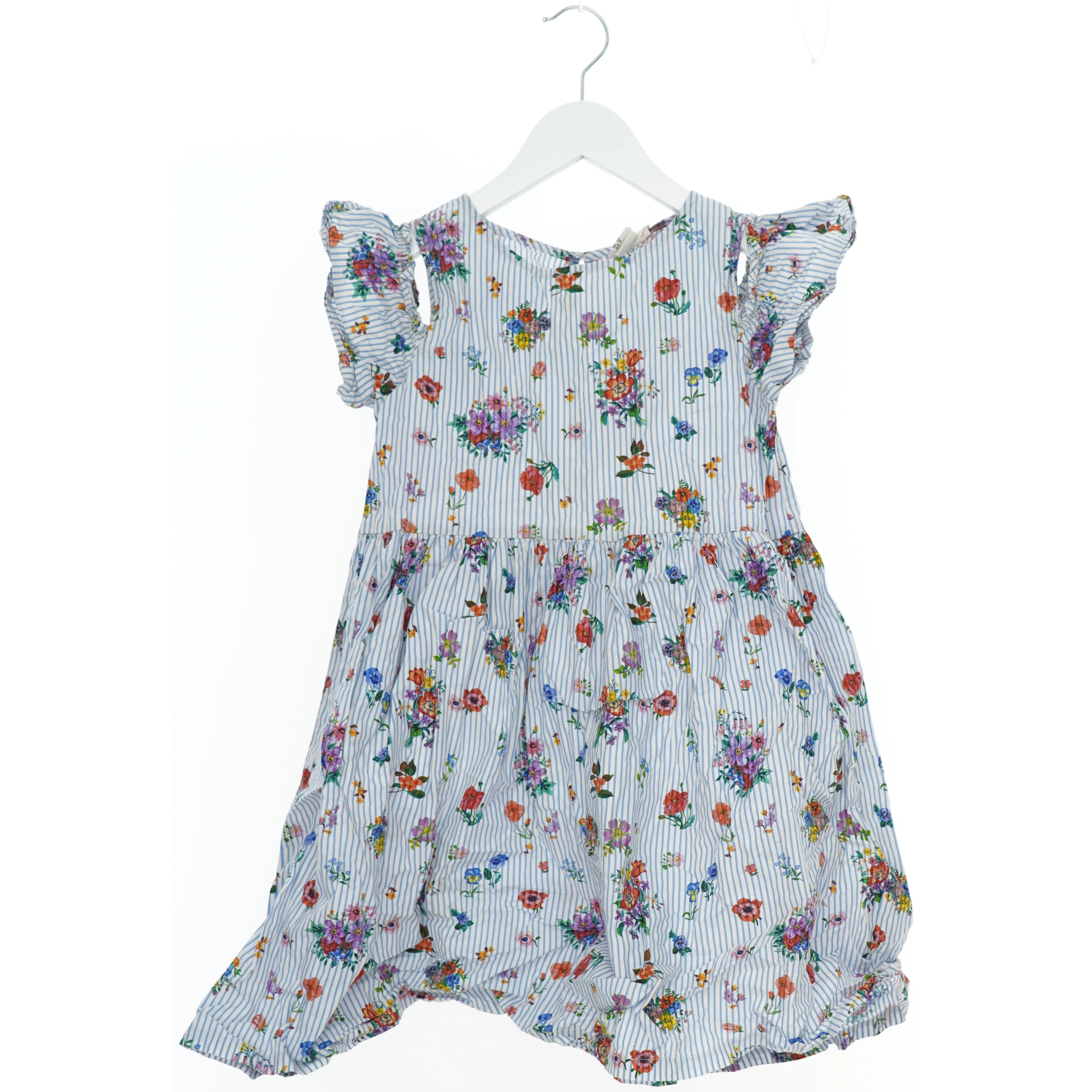 Blomstret kjole til børn fra H&M (str. 140)