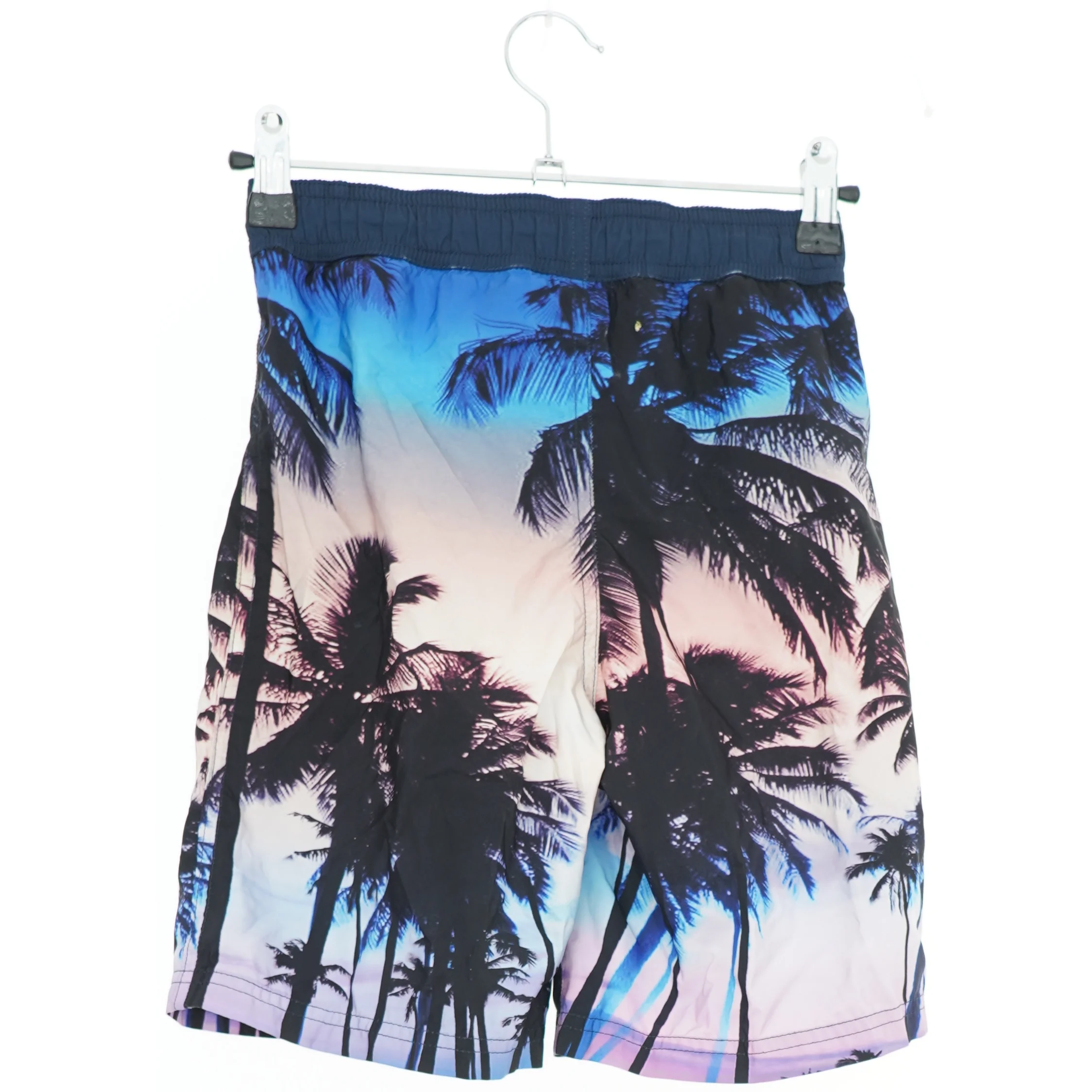 Badeshorts med palmeprint fra H&M (str. 140)