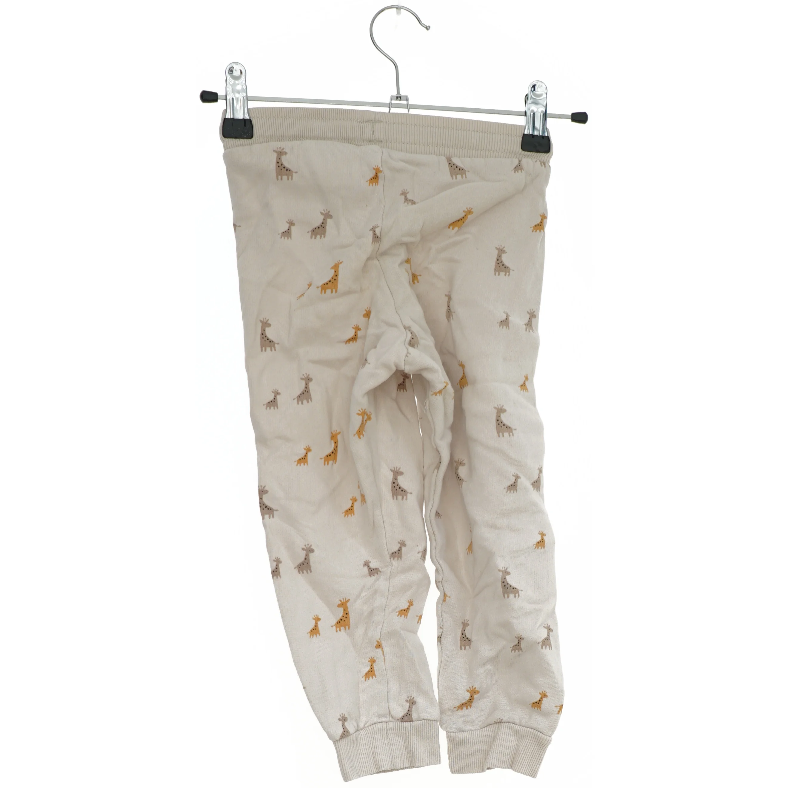 Børnebukser med girafmønster fra H&M (str. 104)