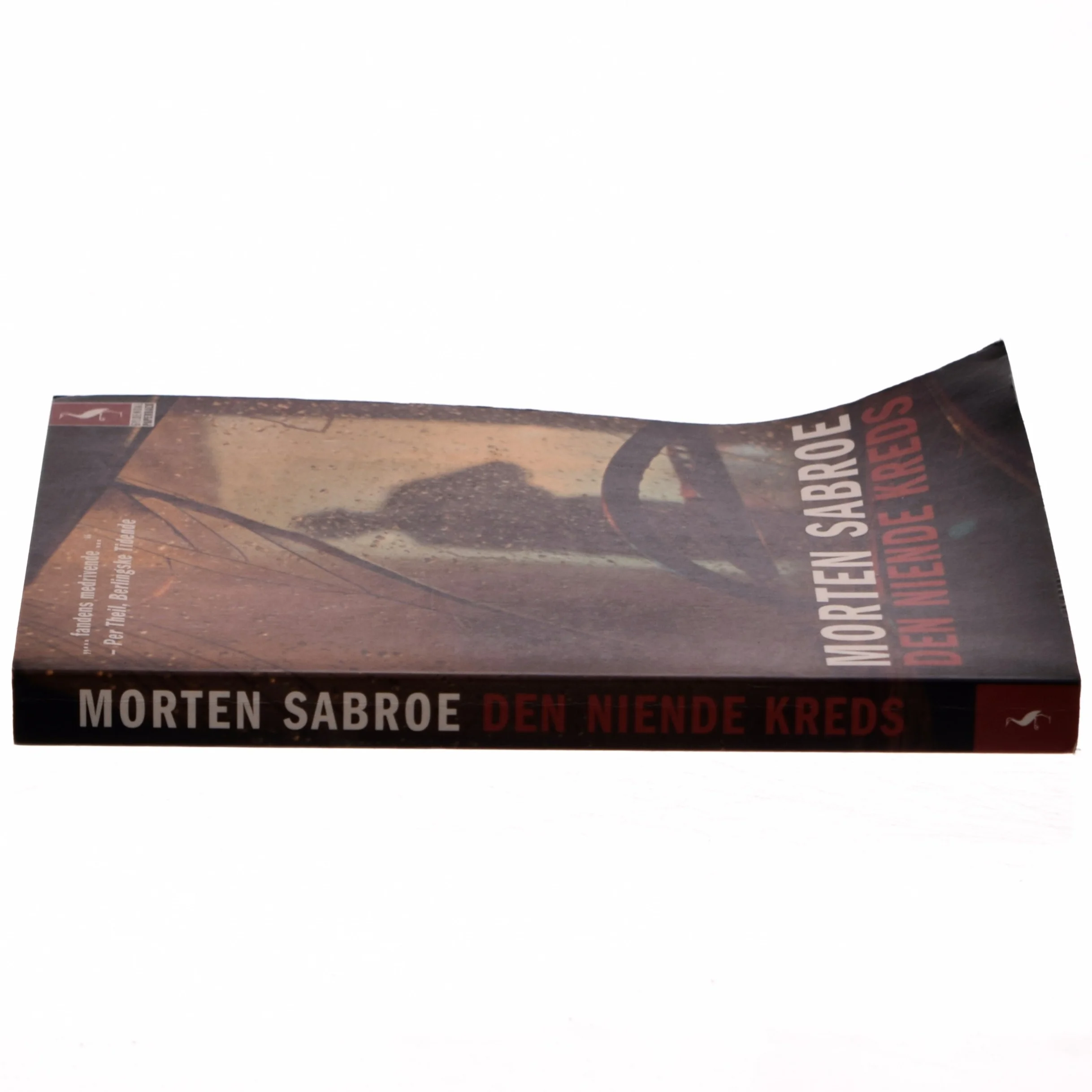 Den niende kreds : roman af Morten Sabroe (Bog)