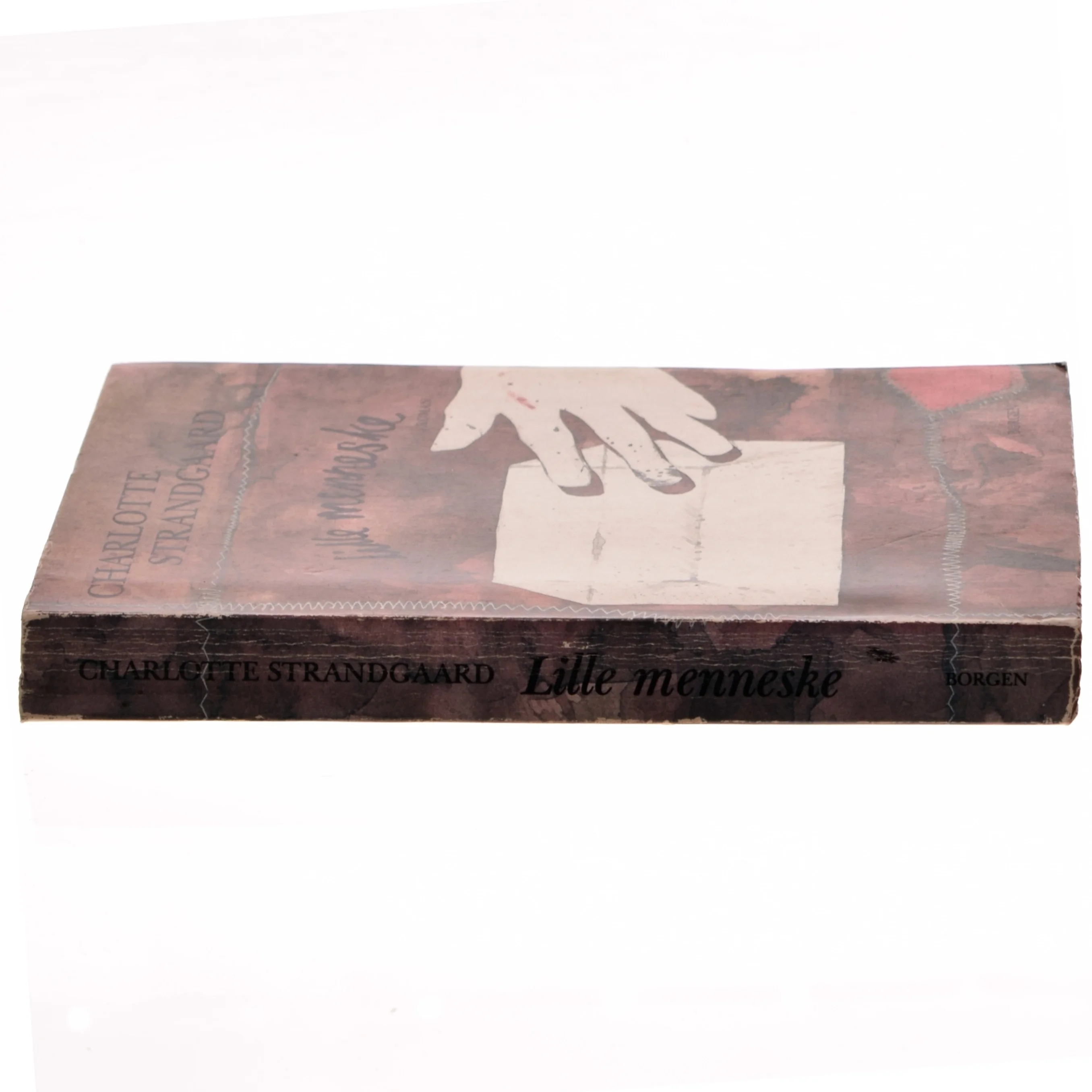 Paperback roman 'Lille menneske' af Charlotte Strandgaard