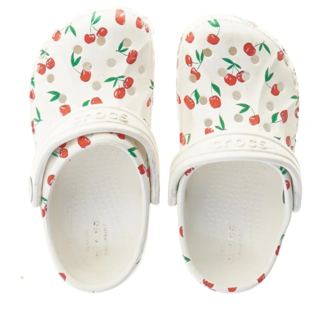 Crocs til børn med kirsebærprint fra Crocs (str. længde 19 )