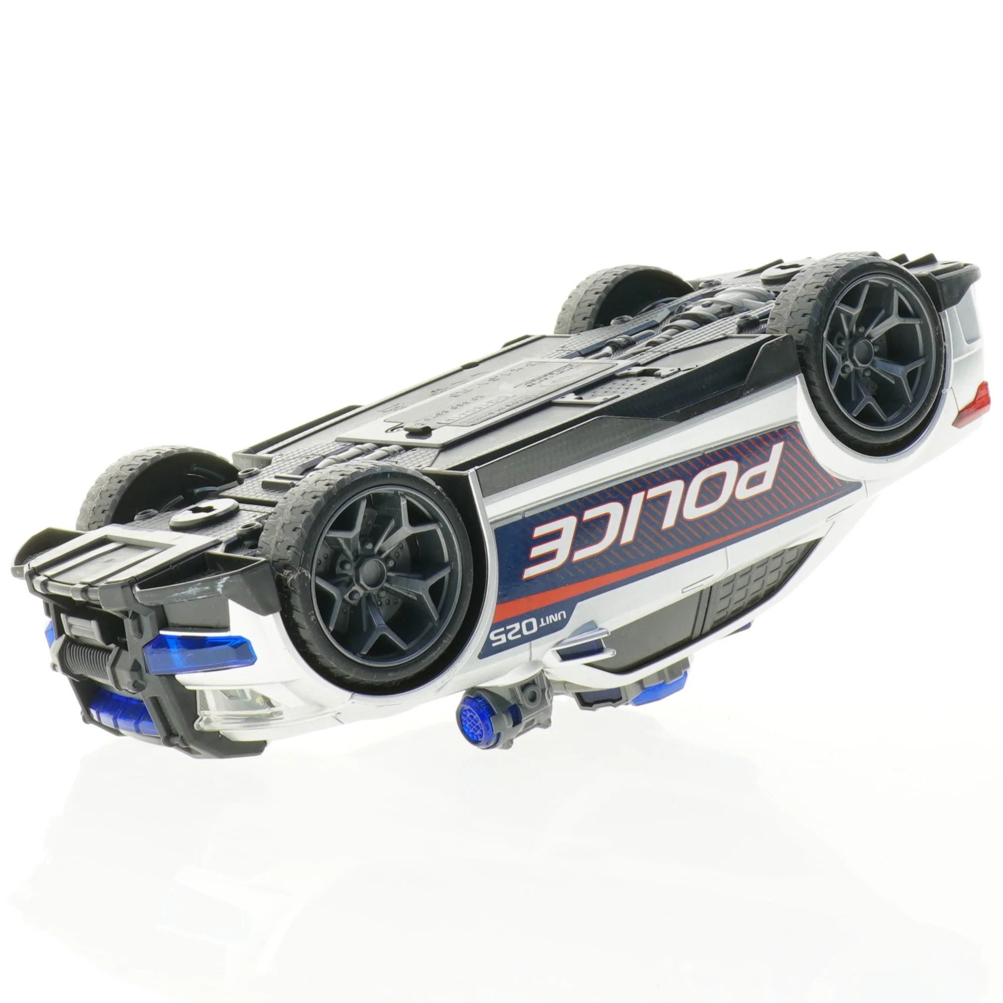 Politibil, måske fjernstyret (str. 33 x 14 x 11 cm)