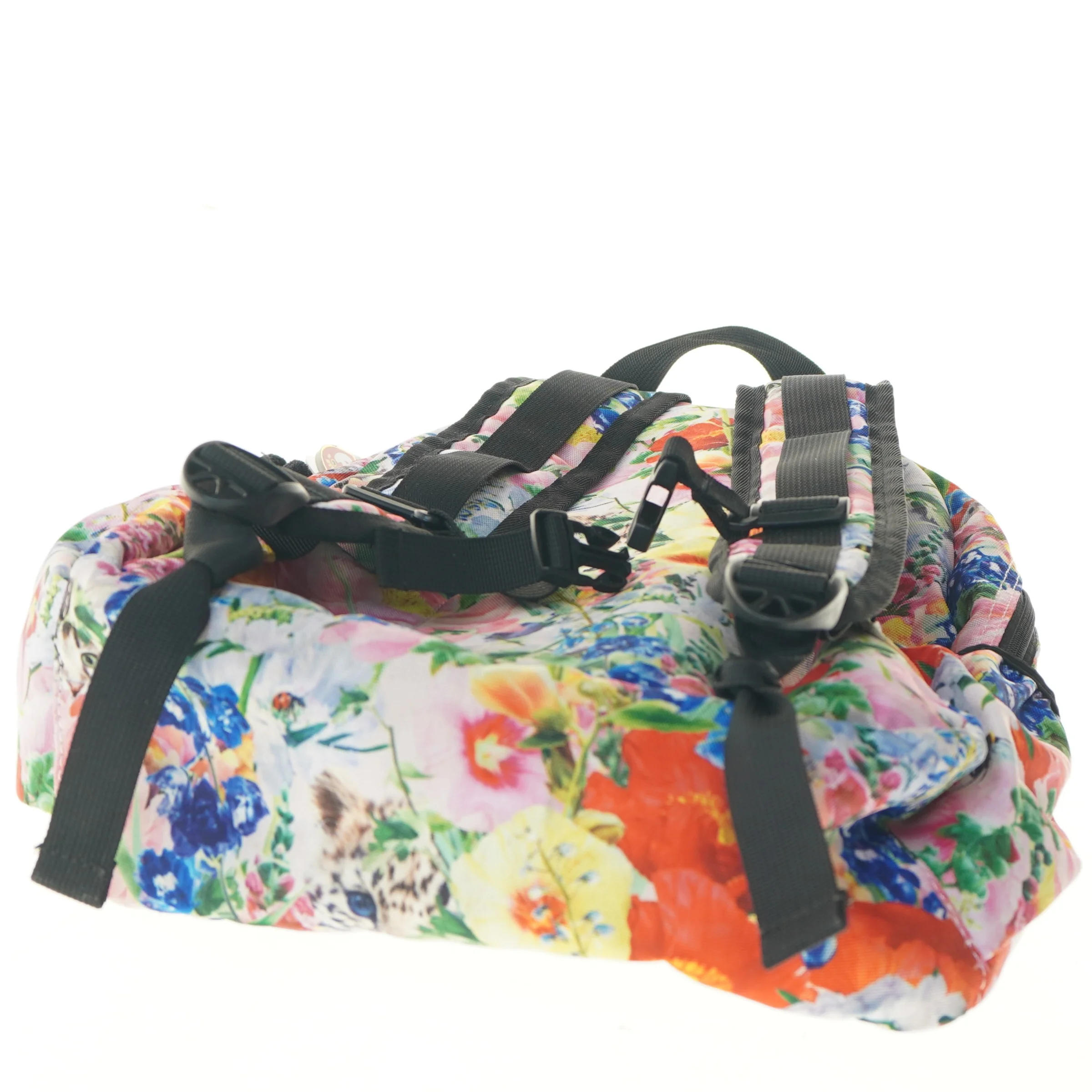 Blomstret rygsæk med vedhæng (str. 43x17x34 cm)
