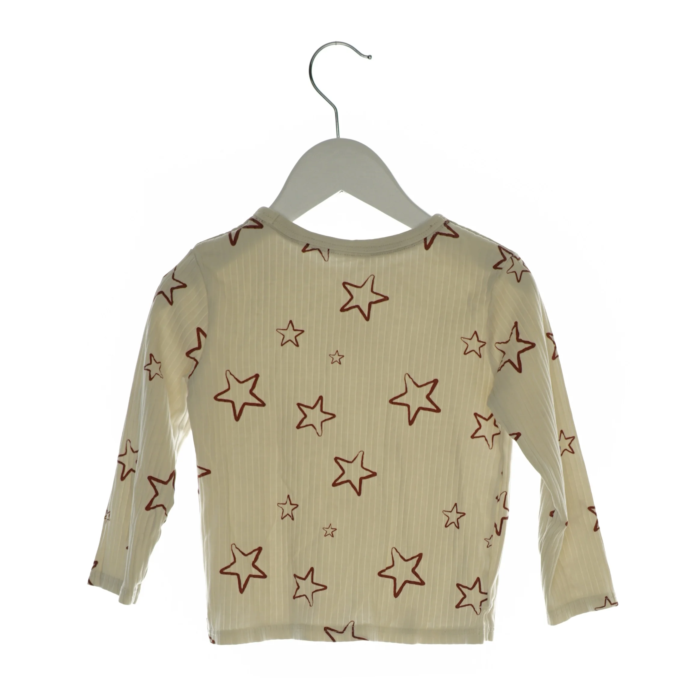 Bluse med stjerner på (str. ca. 104)