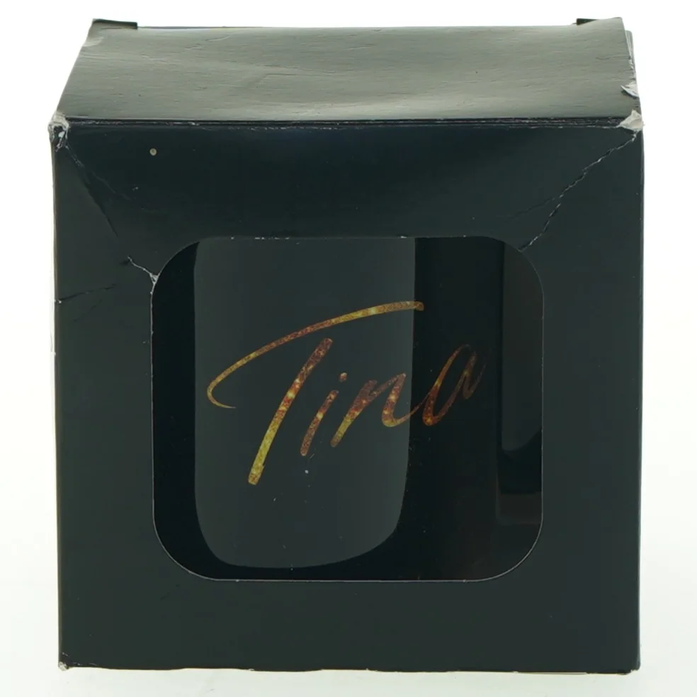 Sort kaffekrus fra musicalen  med 'Tina' i London (str. H 9,5 cm, ø 8 cm)