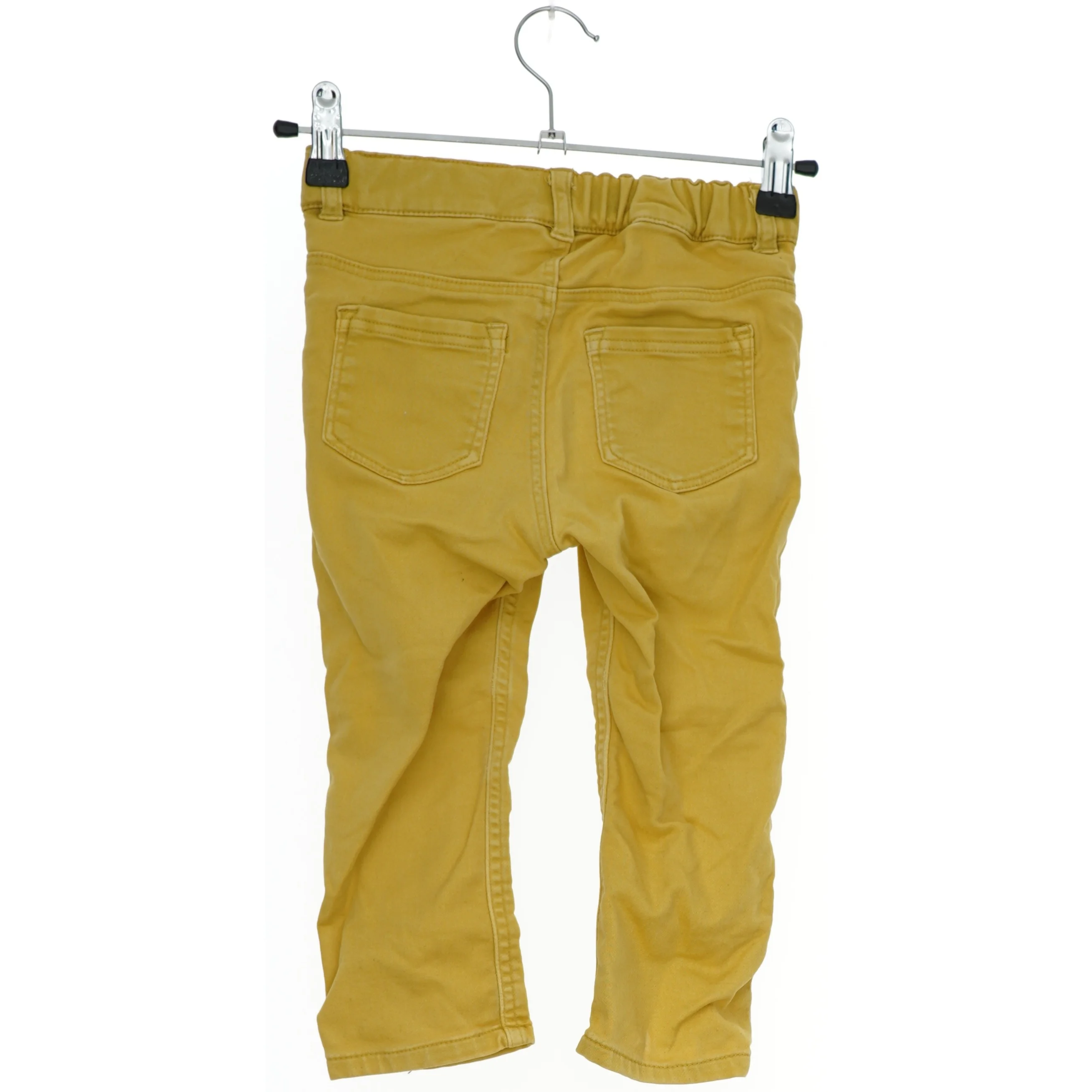 Gule bukser til børn fra H&M (str. 92)
