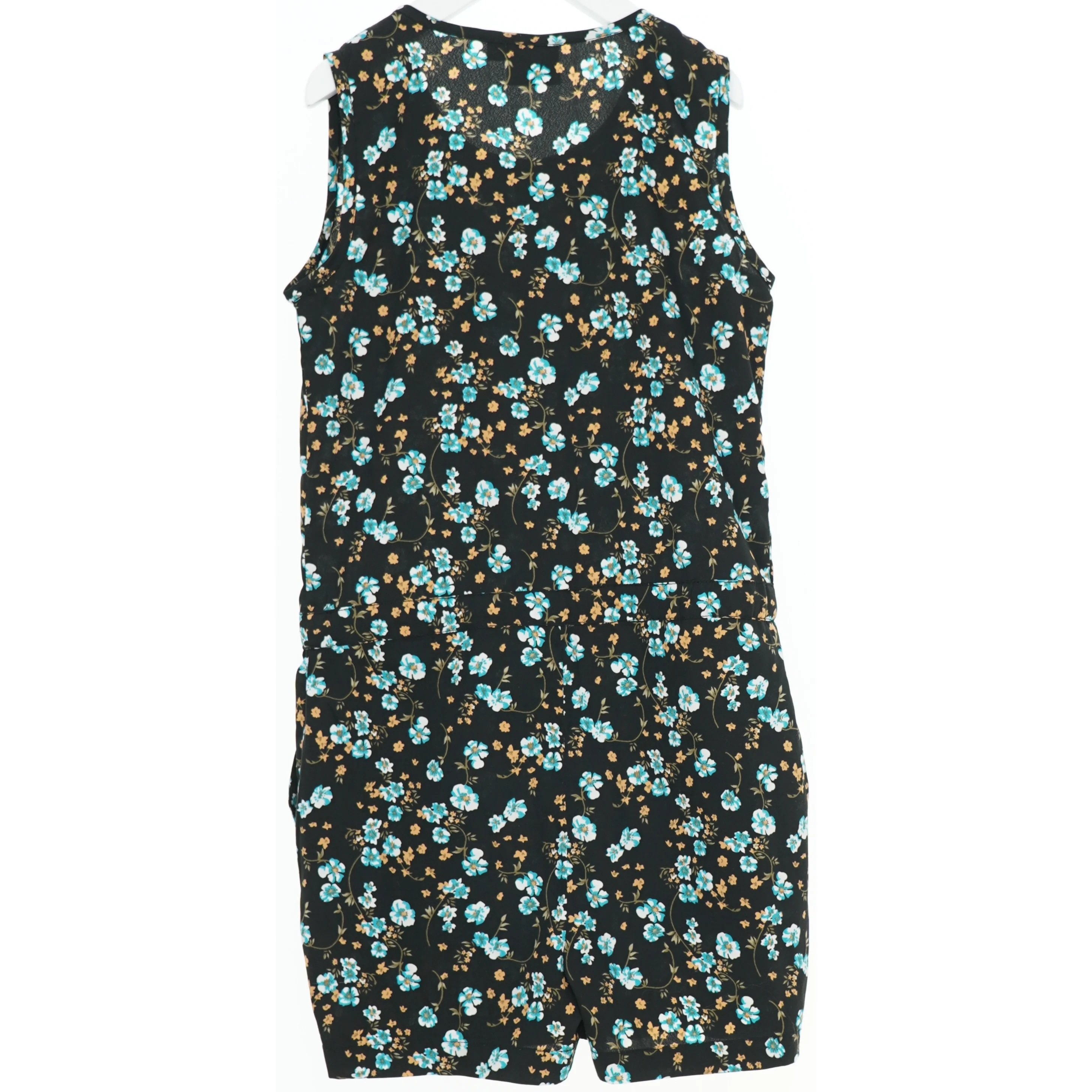 Blomstret buksedragt fra Petit (str. 116)