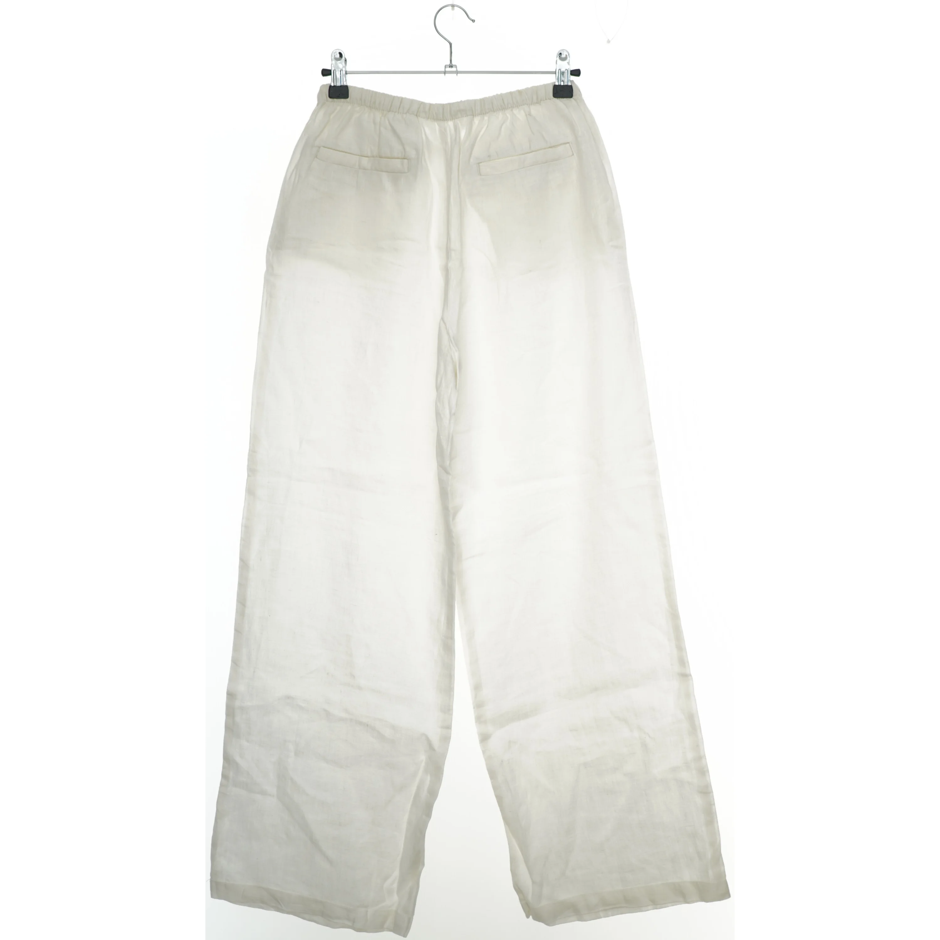 Hvide bukser i hør fra H&M (str. 158)