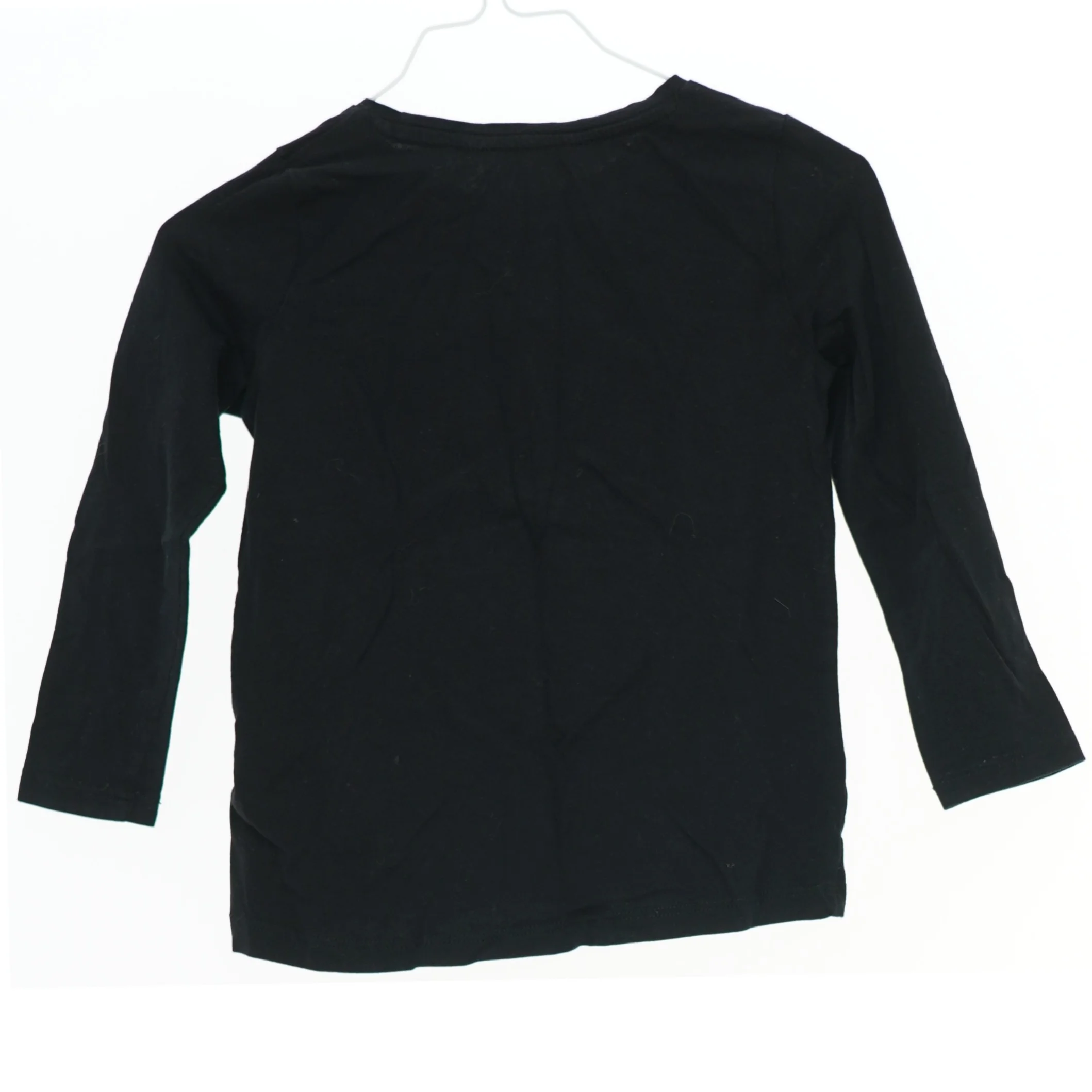 Langærmet bluse med spøgelsesmønster fra H&M (str. 98)