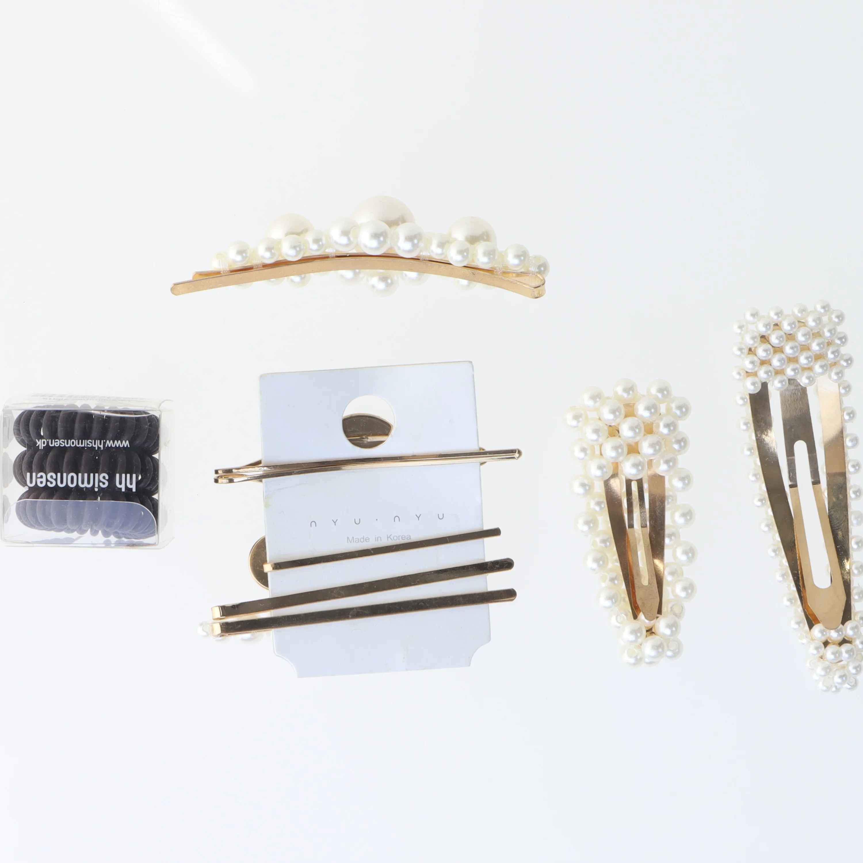 Pynteklemmer med perler fra Nyu Nyu (str. 3,5-9 cm)