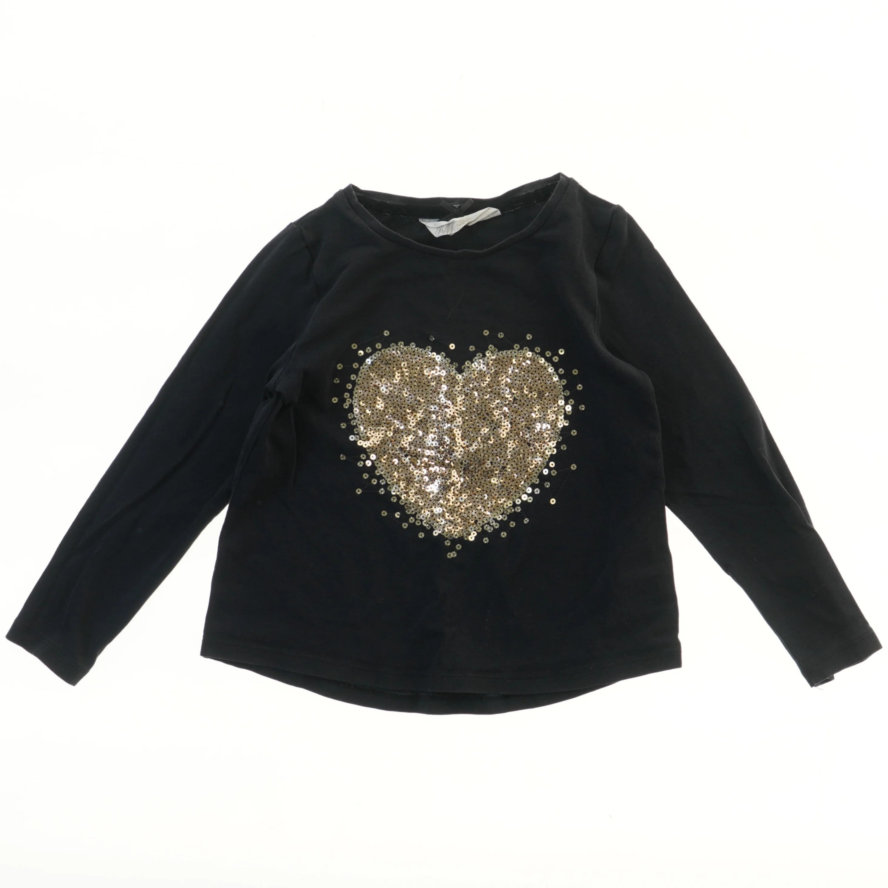 Langærmet trøje med palietter fra H&M (str. 104)