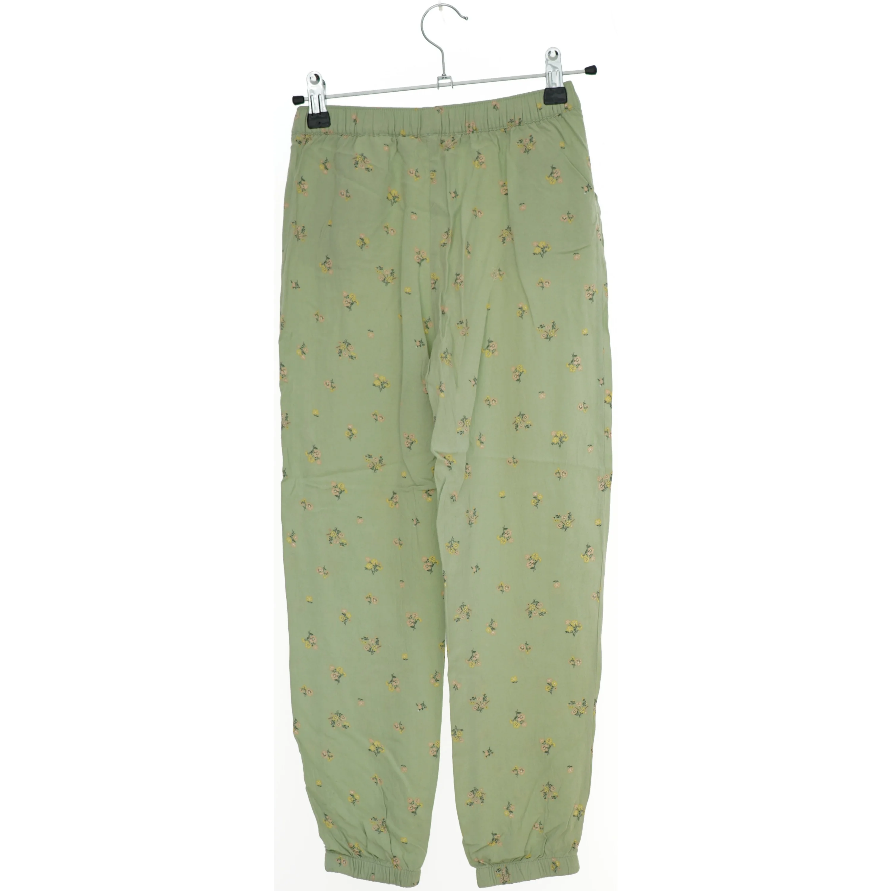 Bukser med blomsterprint fra H&M (str. 140)