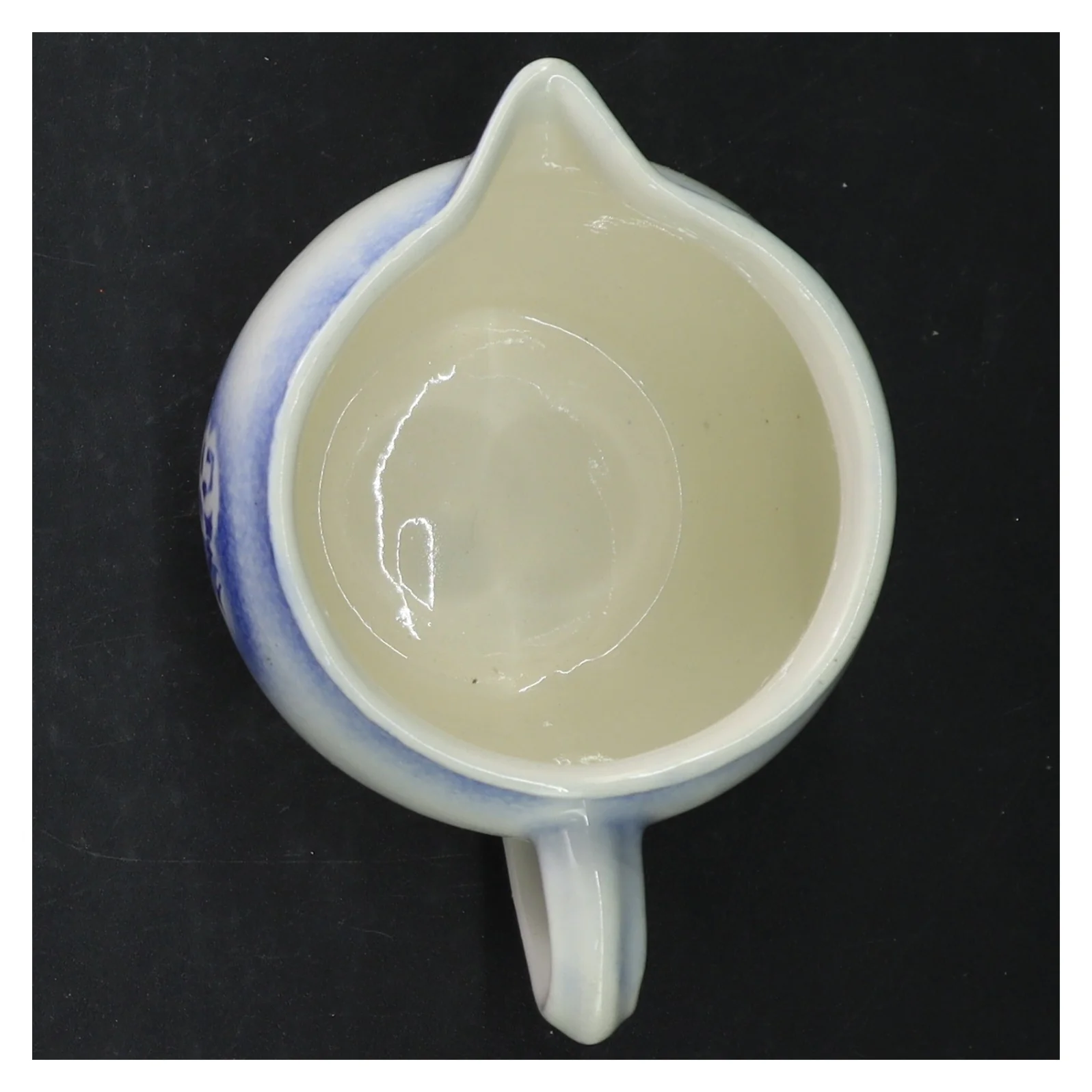 Keramisk kande med blomstermotiv (str. 11 cm)