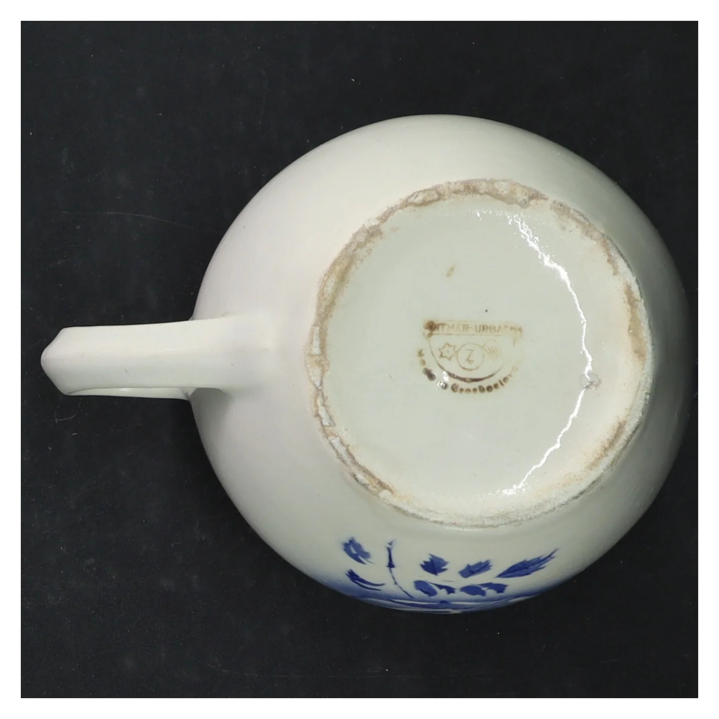 Keramisk kande med blomstermotiv (str. 11 cm)